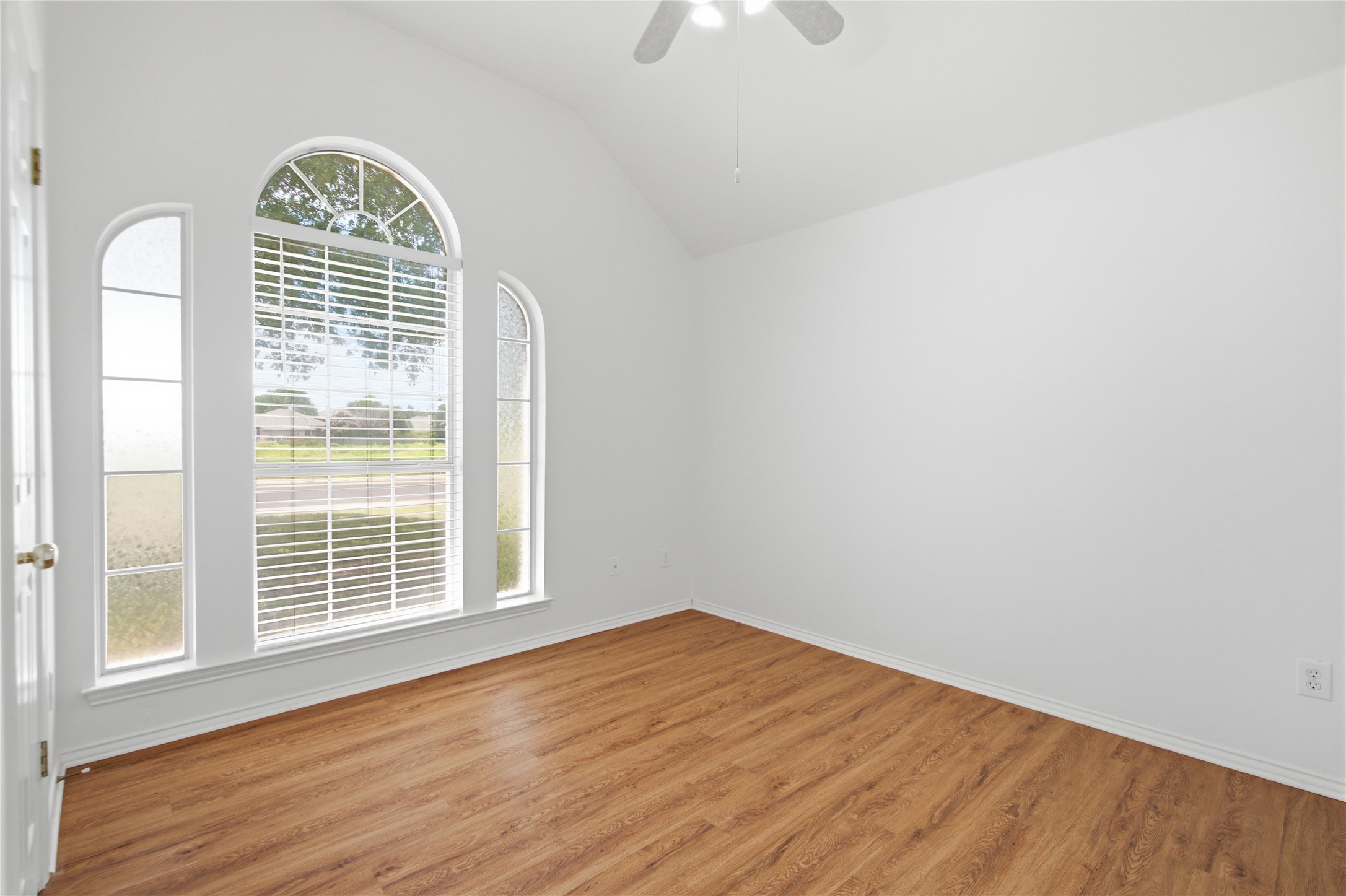 2920 Warwick Way Austin, TX 78748 - Photo 26 of 36 Secondary bedroom #3 features vaulted ceilings and rich wood-like flooring