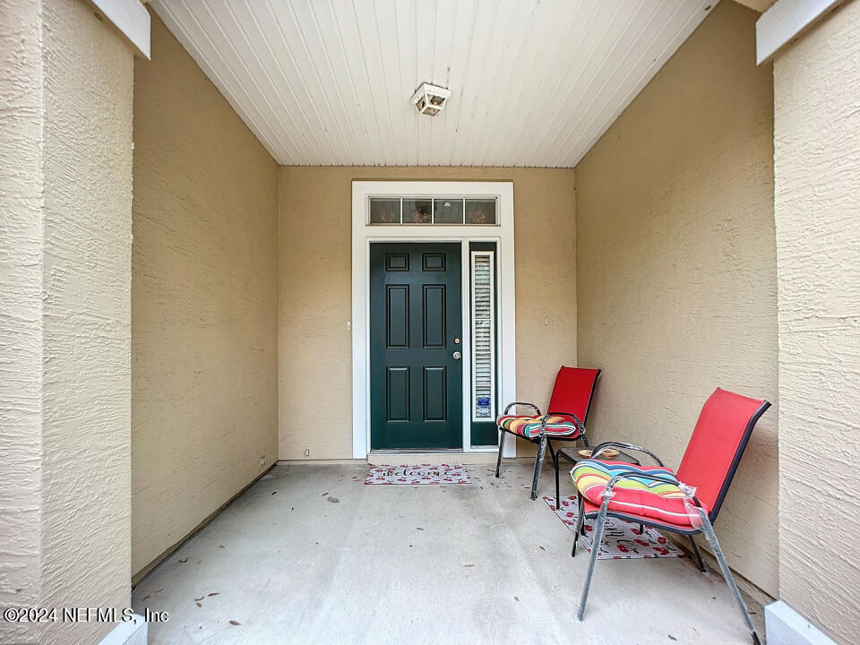 5260 Collins Road, Unit 703 Jacksonville, FL 32244 - Photo 3 of 45 a view of a room with chairs