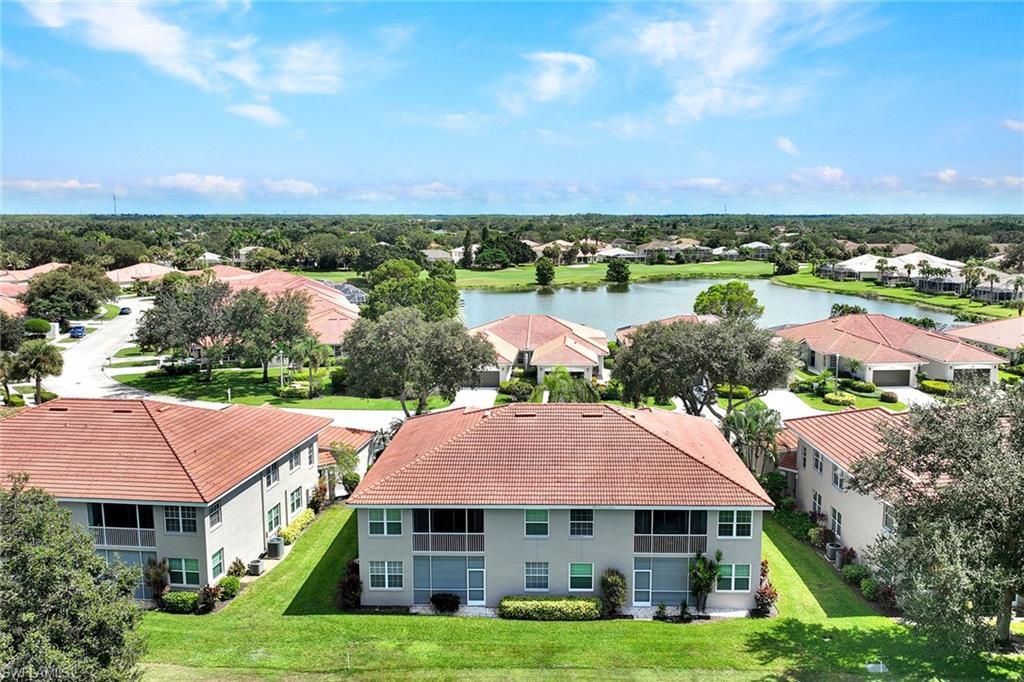 2015 Crestview Way, Unit 17B Naples, FL 34119 - Photo 24 of 29 an aerial view of a house with yard swimming pool and outdoor seating