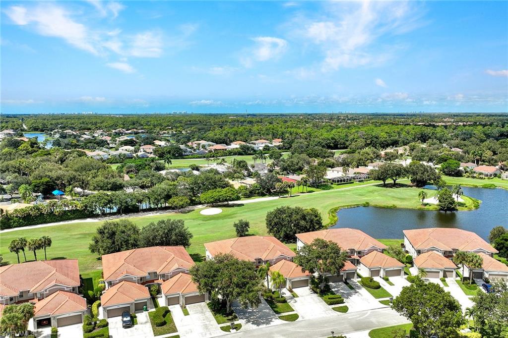 2015 Crestview Way, Unit 17B Naples, FL 34119 - Photo 25 of 29 a view of a lake with a city street view
