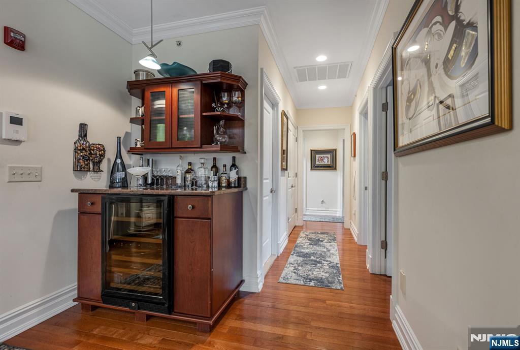 2310 Rio Vista Lane, Unit 2310 Northvale, NJ 07647 - Photo 13 of 49 a view of a hallway with wooden shelves