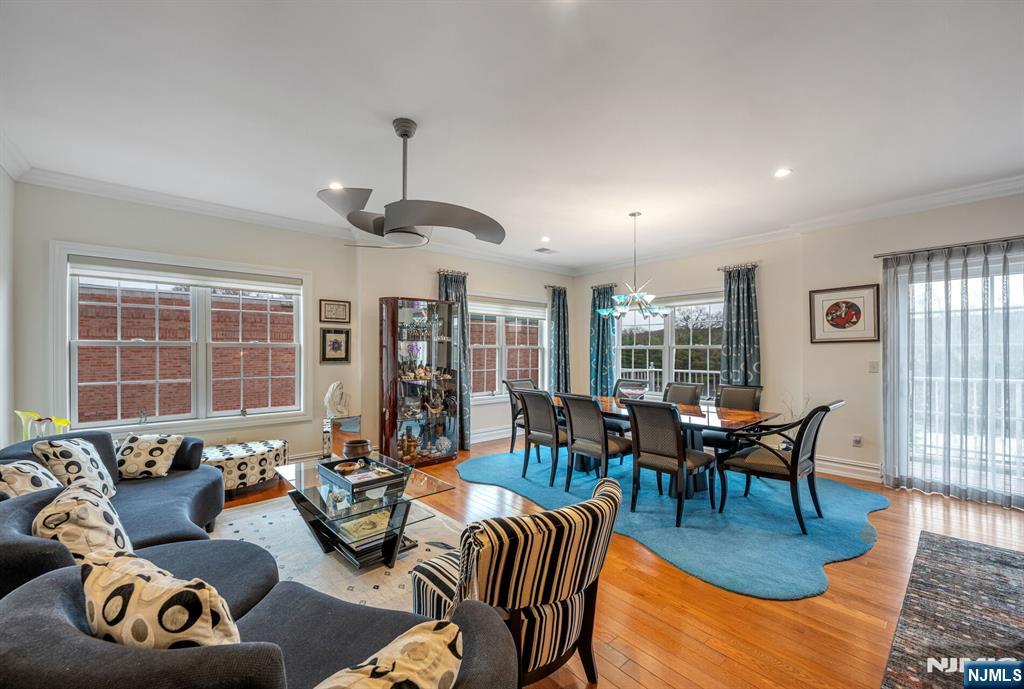 2310 Rio Vista Lane, Unit 2310 Northvale, NJ 07647 - Photo 15 of 49 a living room with furniture and floor to ceiling windows