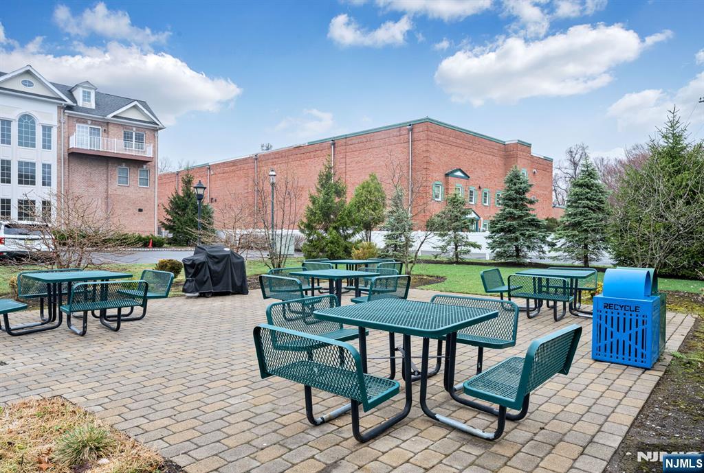 2310 Rio Vista Lane, Unit 2310 Northvale, NJ 07647 - Photo 35 of 49 a view of a chairs and table in patio