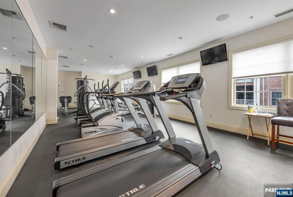 2310 Rio Vista Lane, Unit 2310 Northvale, NJ 07647 - Photo 43 of 49 a view of a room with gym equipment