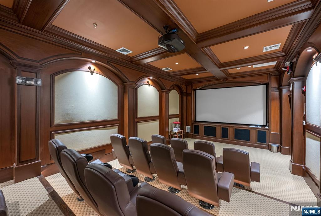 2310 Rio Vista Lane, Unit 2310 Northvale, NJ 07647 - Photo 47 of 49 a media room with lots of chairs and a projector screen