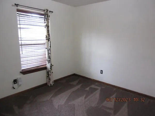an empty room with a window