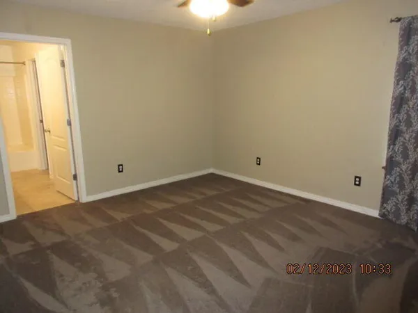 a view of a room with an empty space