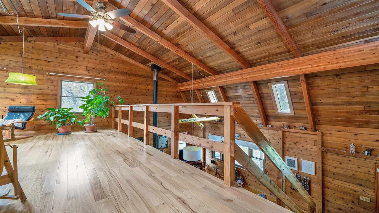 6315 North River Road Byron, IL 61010 - Photo 26 of 40 a view of a patio with wooden floor