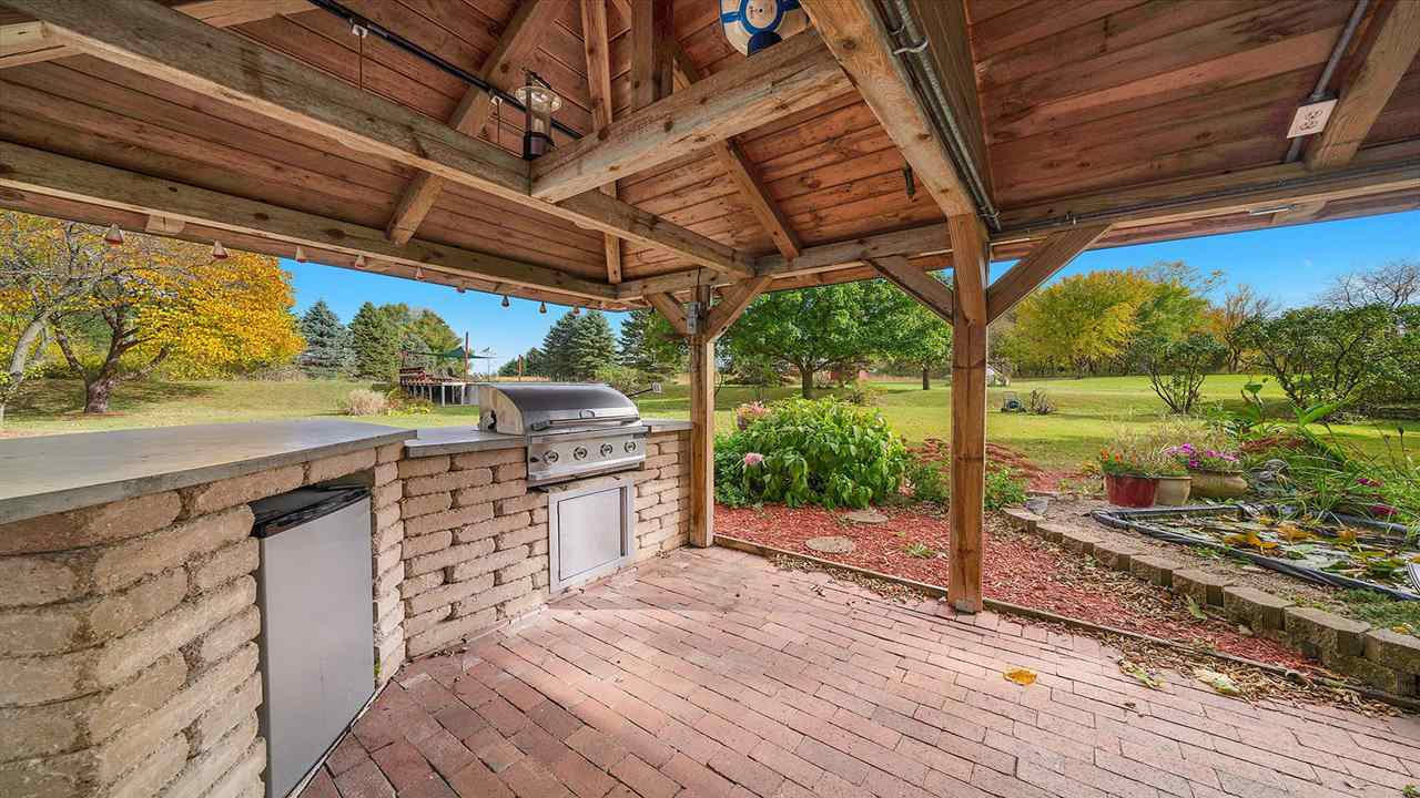 6315 North River Road Byron, IL 61010 - Photo 36 of 40 a view of a porch