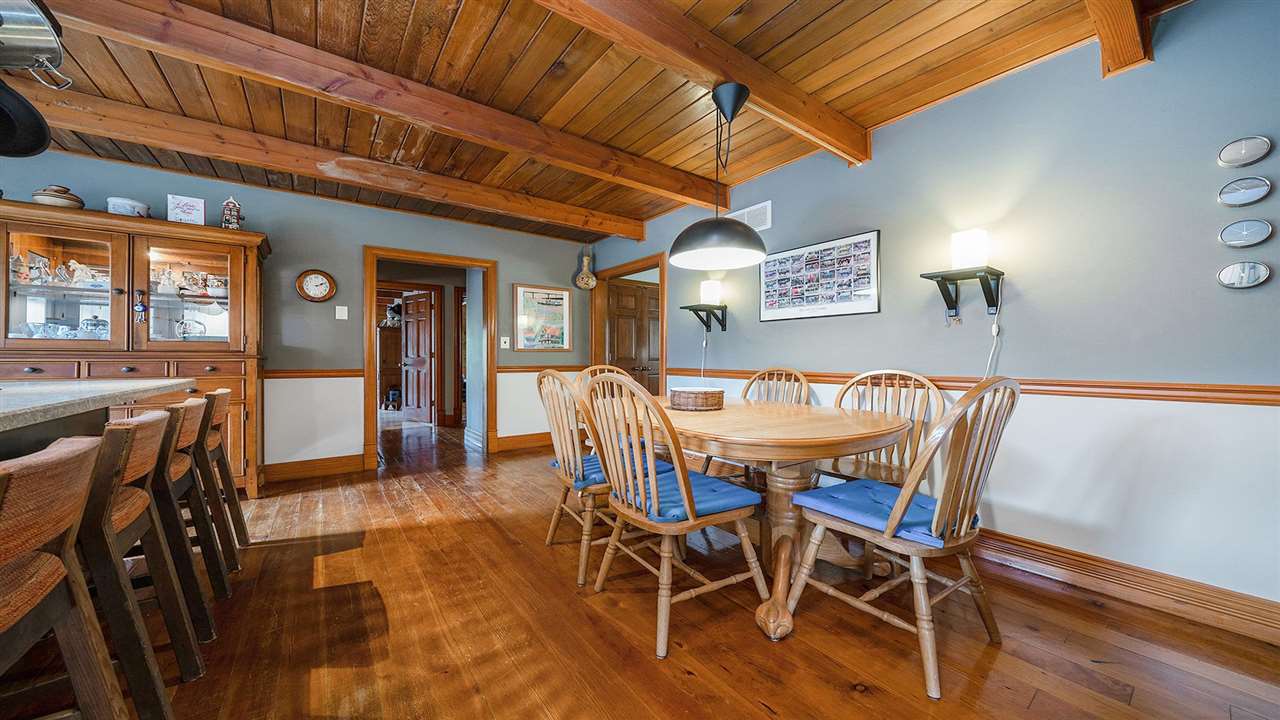 6315 North River Road Byron, IL 61010 - Photo 9 of 40 a view of a dining room with furniture