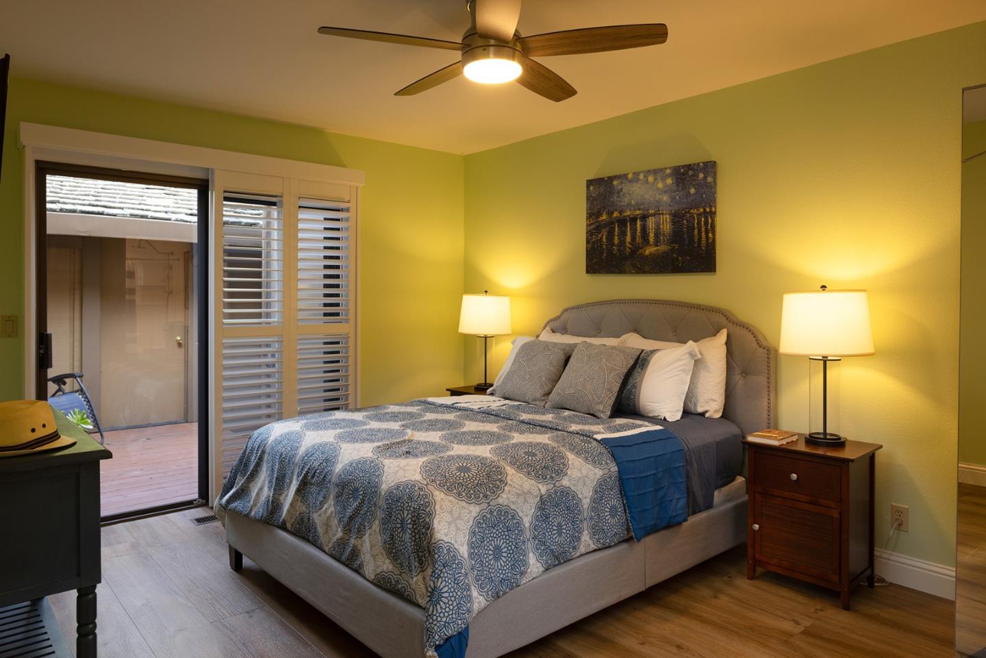 3850 Rio Road, Unit 63 Carmel, CA 93923 - Photo 10 of 19 a bedroom with a bed and lamps