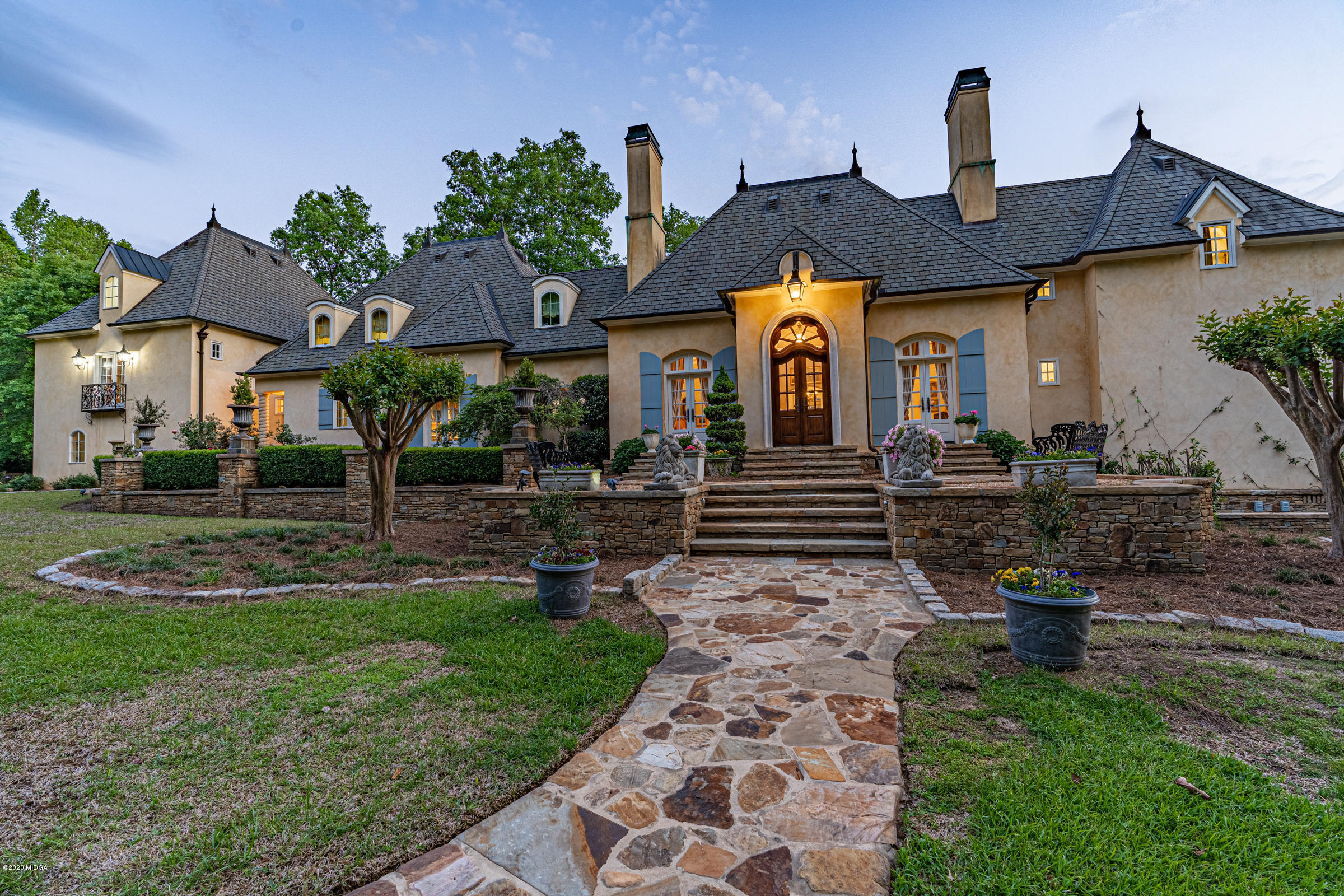 265 Sanders Road Macon, GA 31210 - Photo 50 of 61 a front view of a house with garden