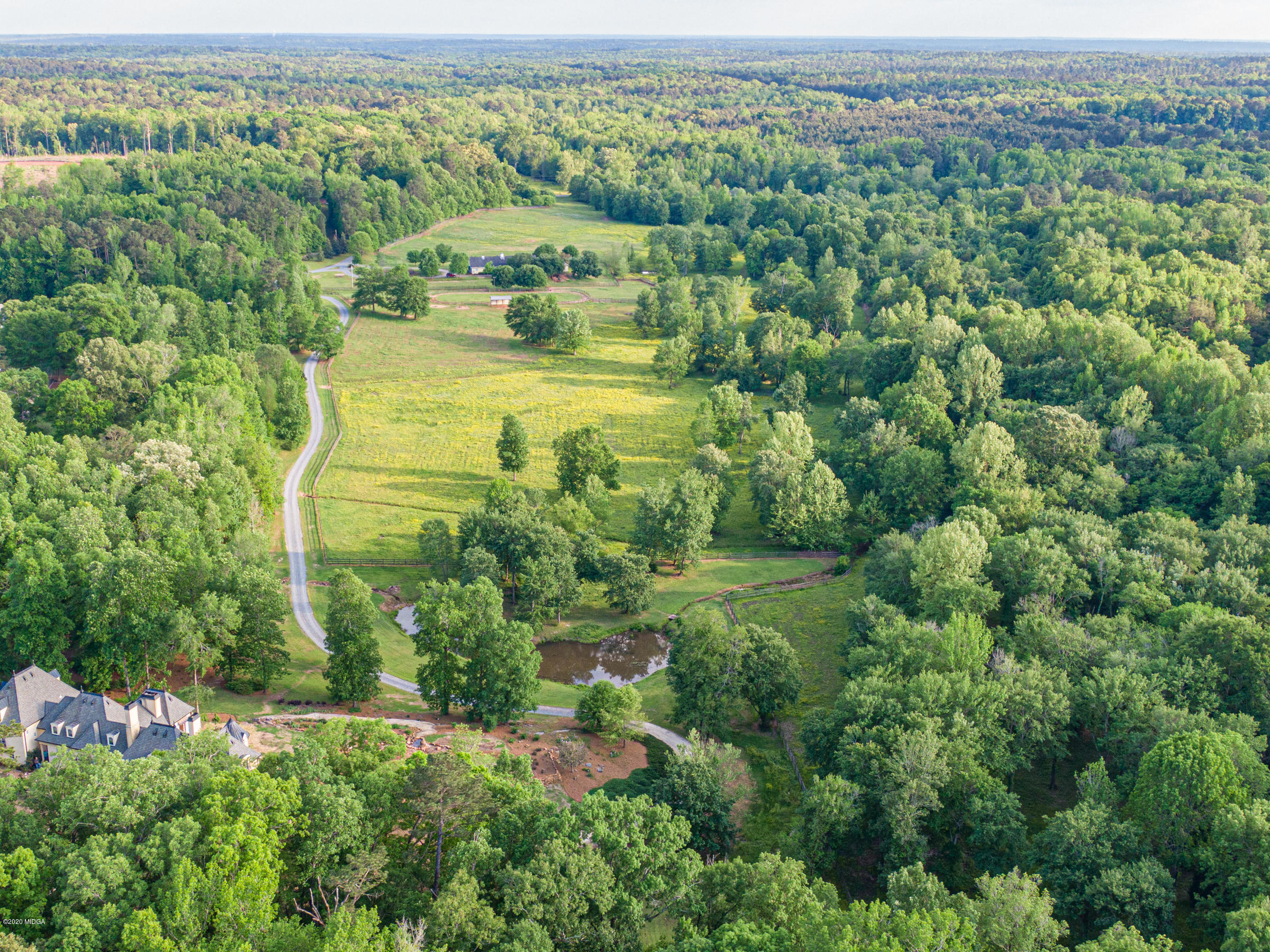 265 Sanders Road Macon, GA 31210 - Photo 53 of 61 an aerial view of residential houses with outdoor space and trees