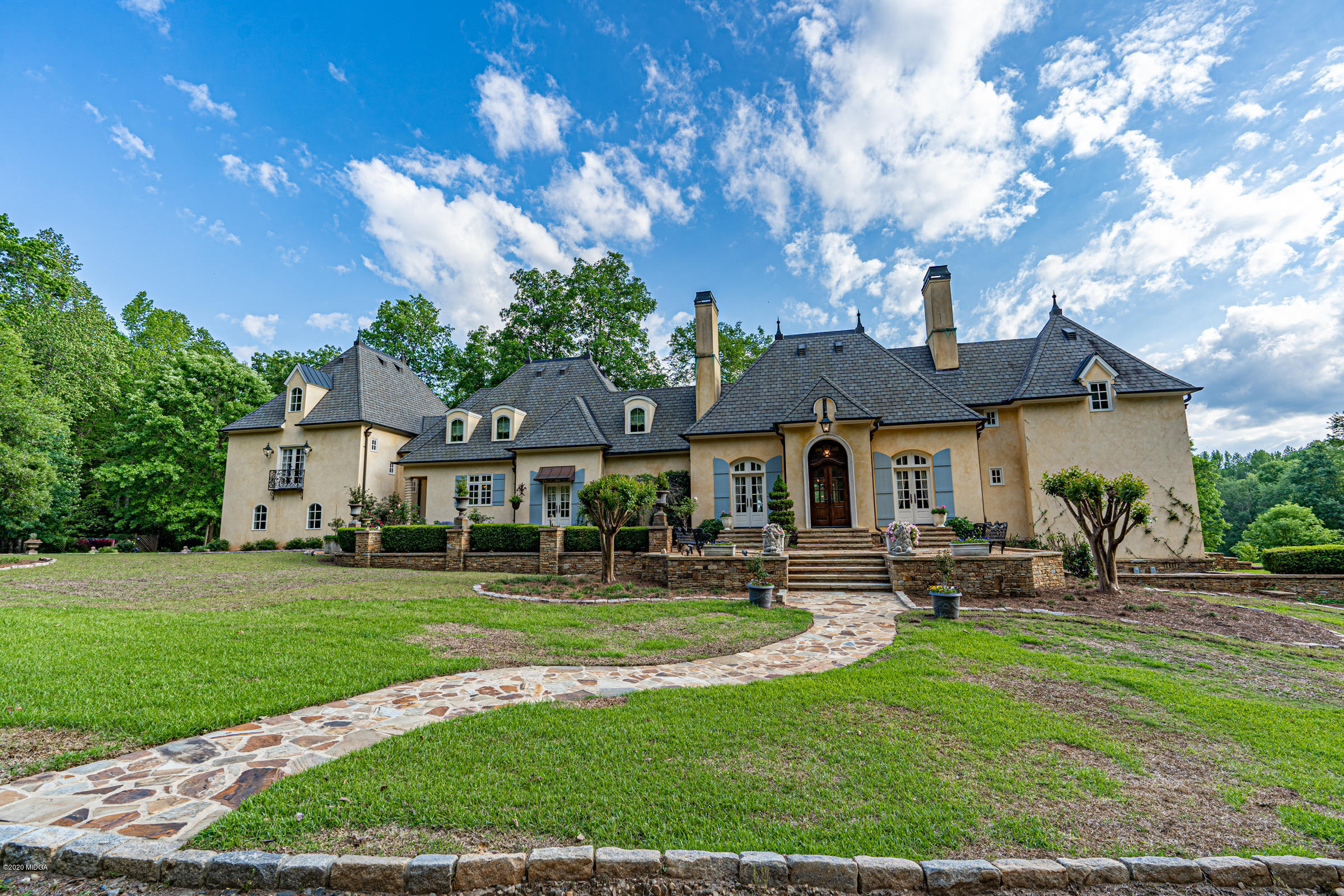 265 Sanders Road Macon, GA 31210 - Photo 60 of 61 a front view of a house with garden