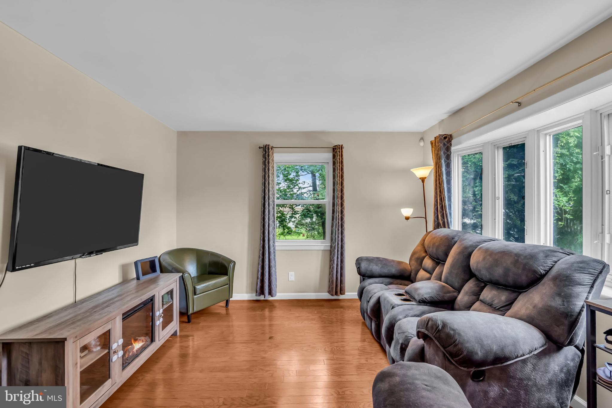 2002 South Brighton Avenue Clementon, NJ 08021 - Photo 11 of 38 a living room with furniture and a flat screen tv