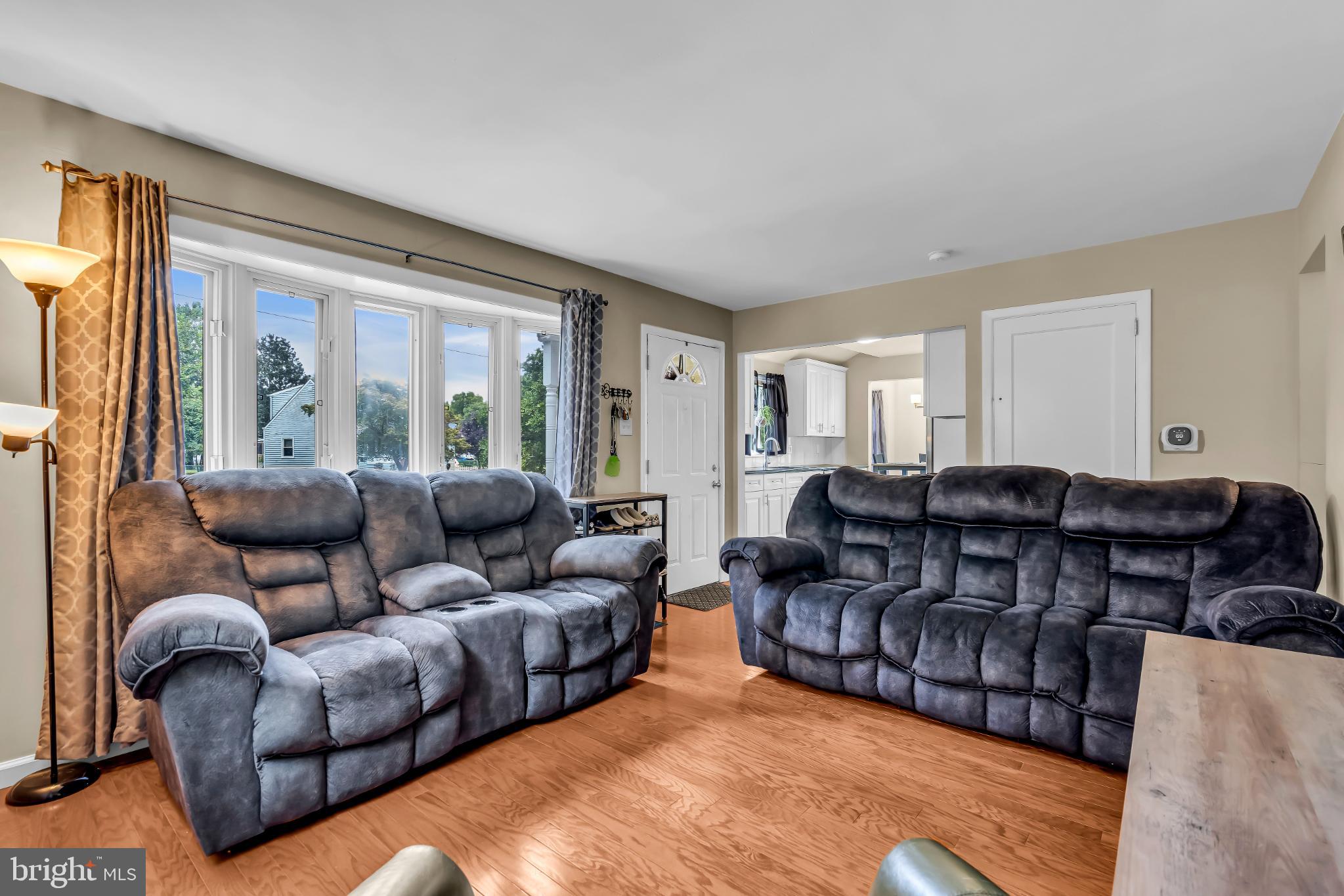 2002 South Brighton Avenue Clementon, NJ 08021 - Photo 12 of 38 a living room with furniture and a large window