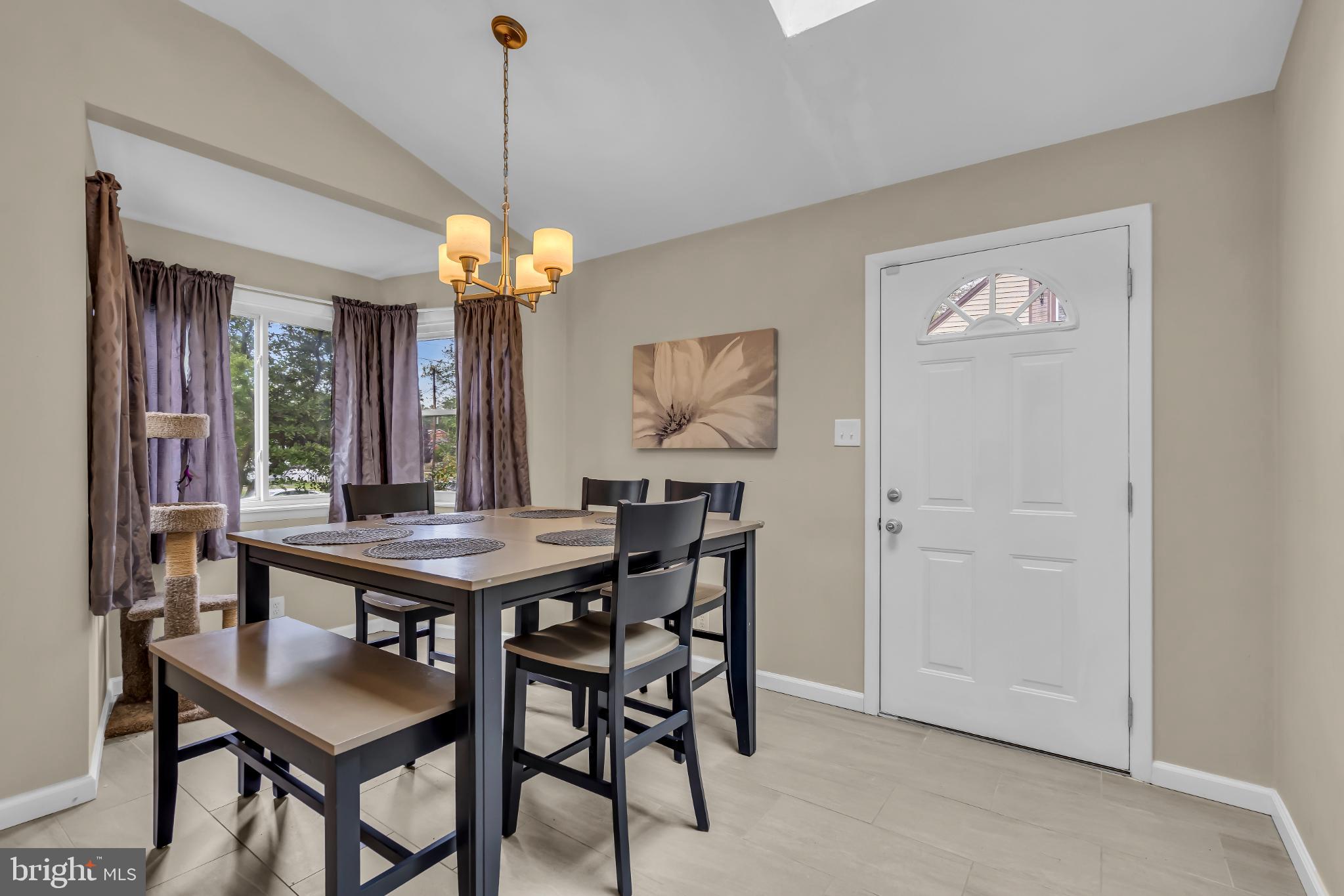 2002 South Brighton Avenue Clementon, NJ 08021 - Photo 19 of 38 a view of a dining room with furniture window and wooden floor