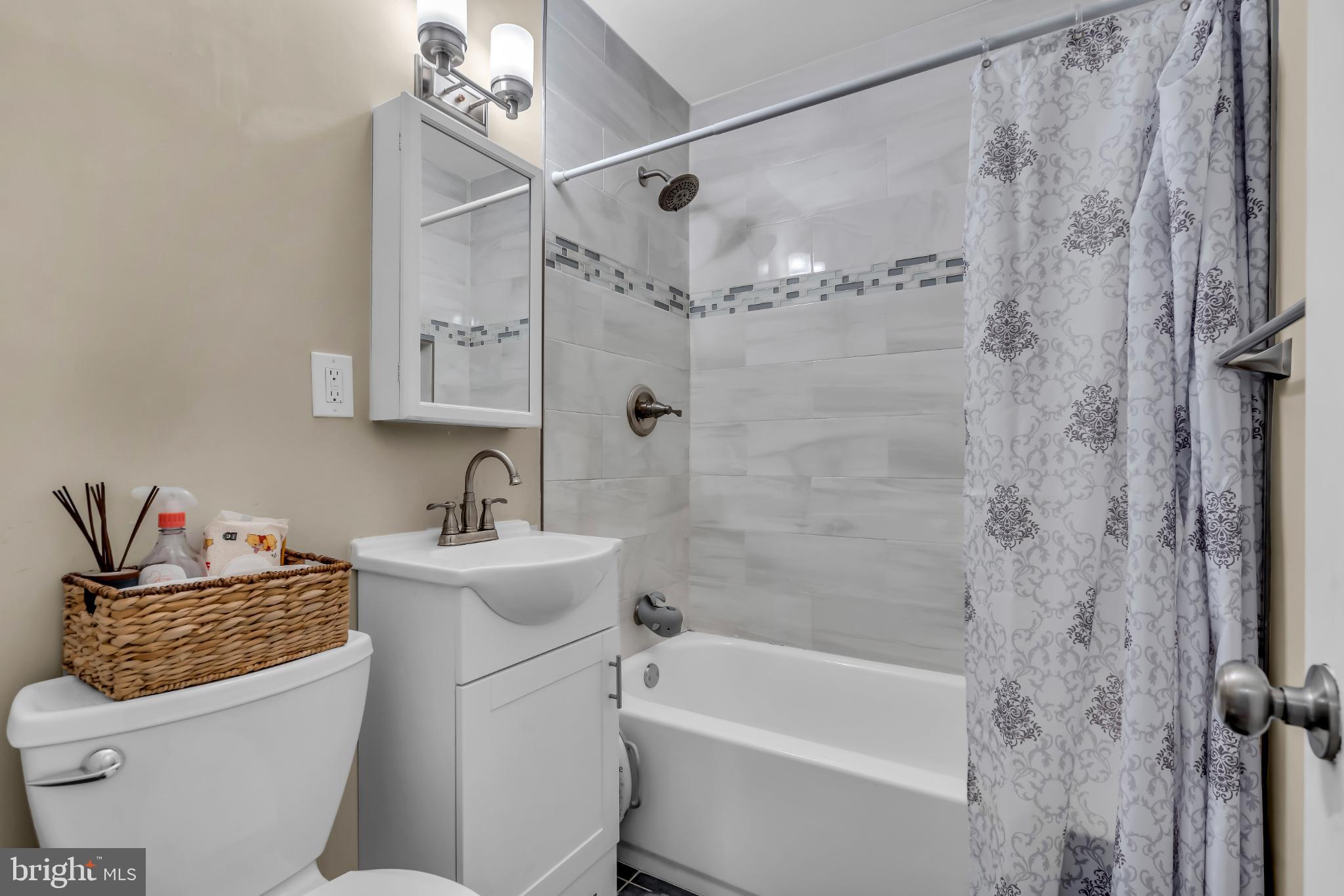 2002 South Brighton Avenue Clementon, NJ 08021 - Photo 23 of 38 a bathroom with a sink a toilet and shower