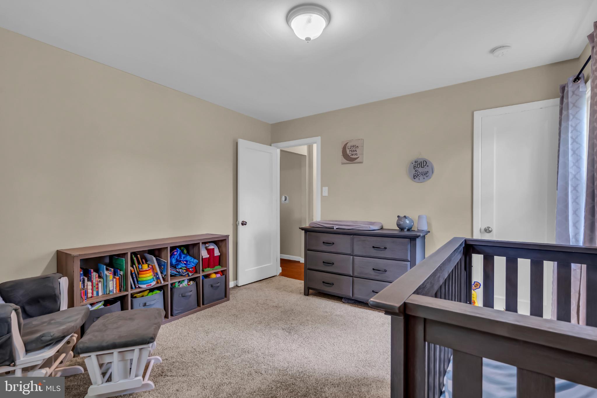 2002 South Brighton Avenue Clementon, NJ 08021 - Photo 26 of 38 a living room with furniture and a book shelf