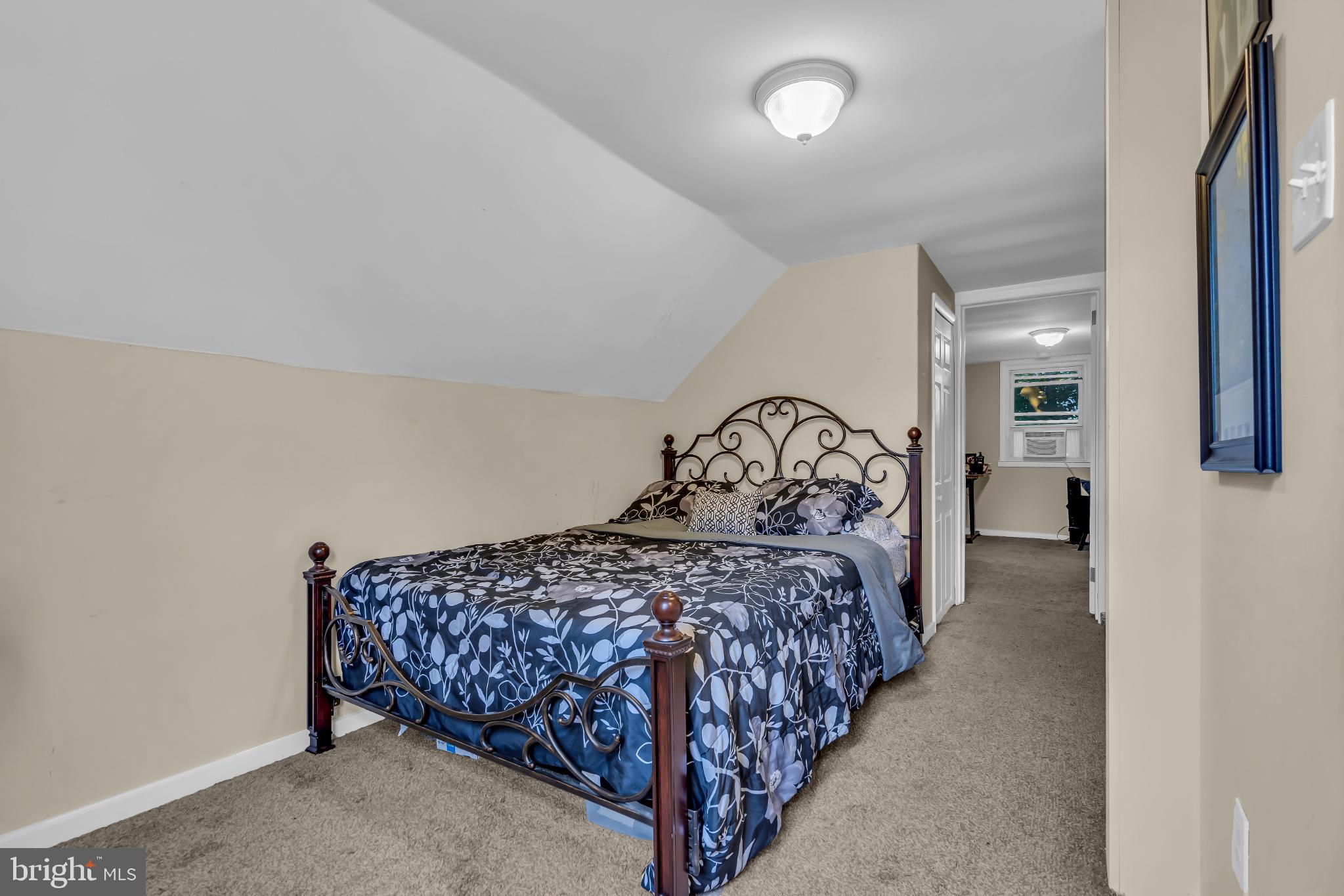 2002 South Brighton Avenue Clementon, NJ 08021 - Photo 31 of 38 a bedroom with a bed and a mirror