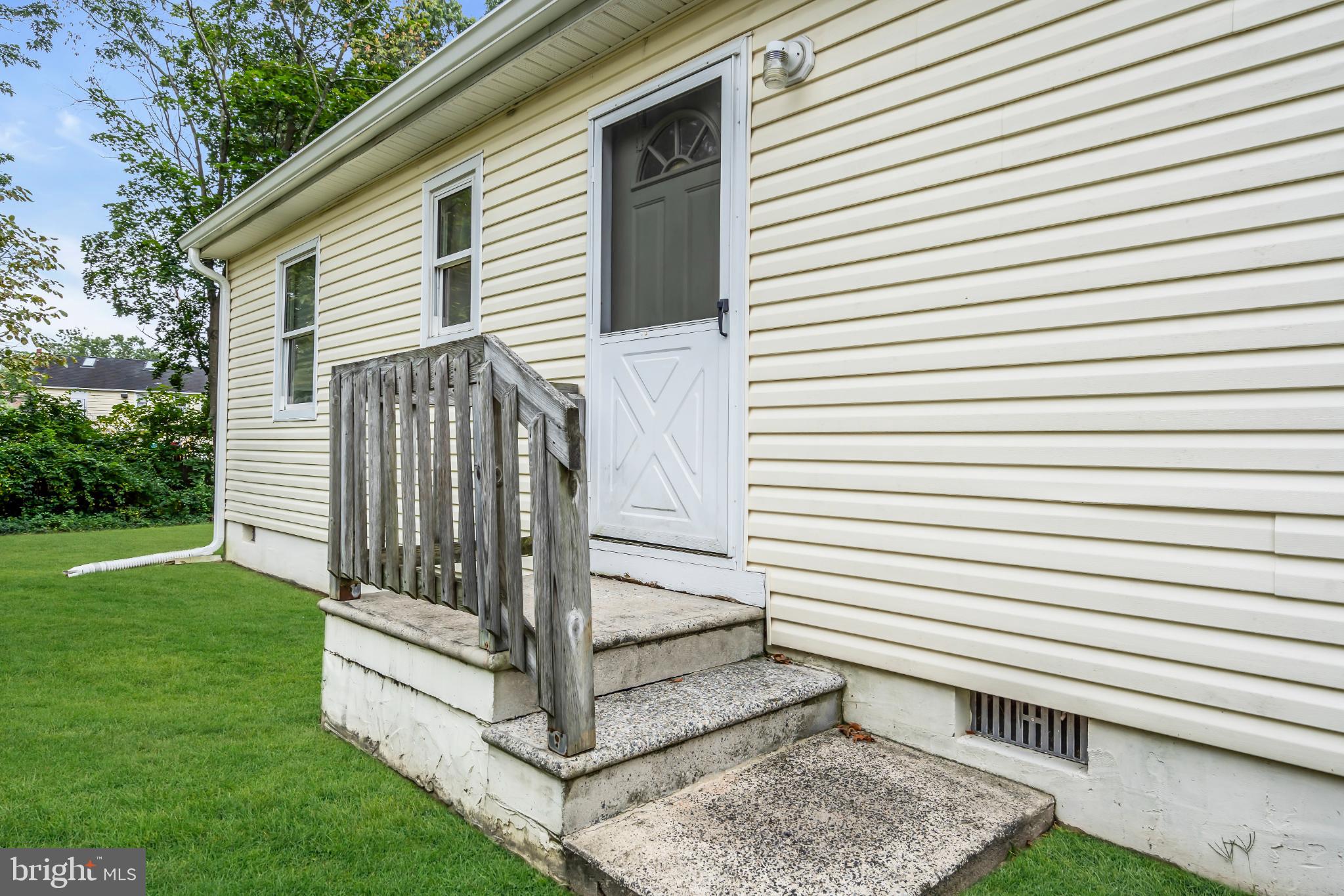 2002 South Brighton Avenue Clementon, NJ 08021 - Photo 37 of 38 a view of a white house with a yard and stairs