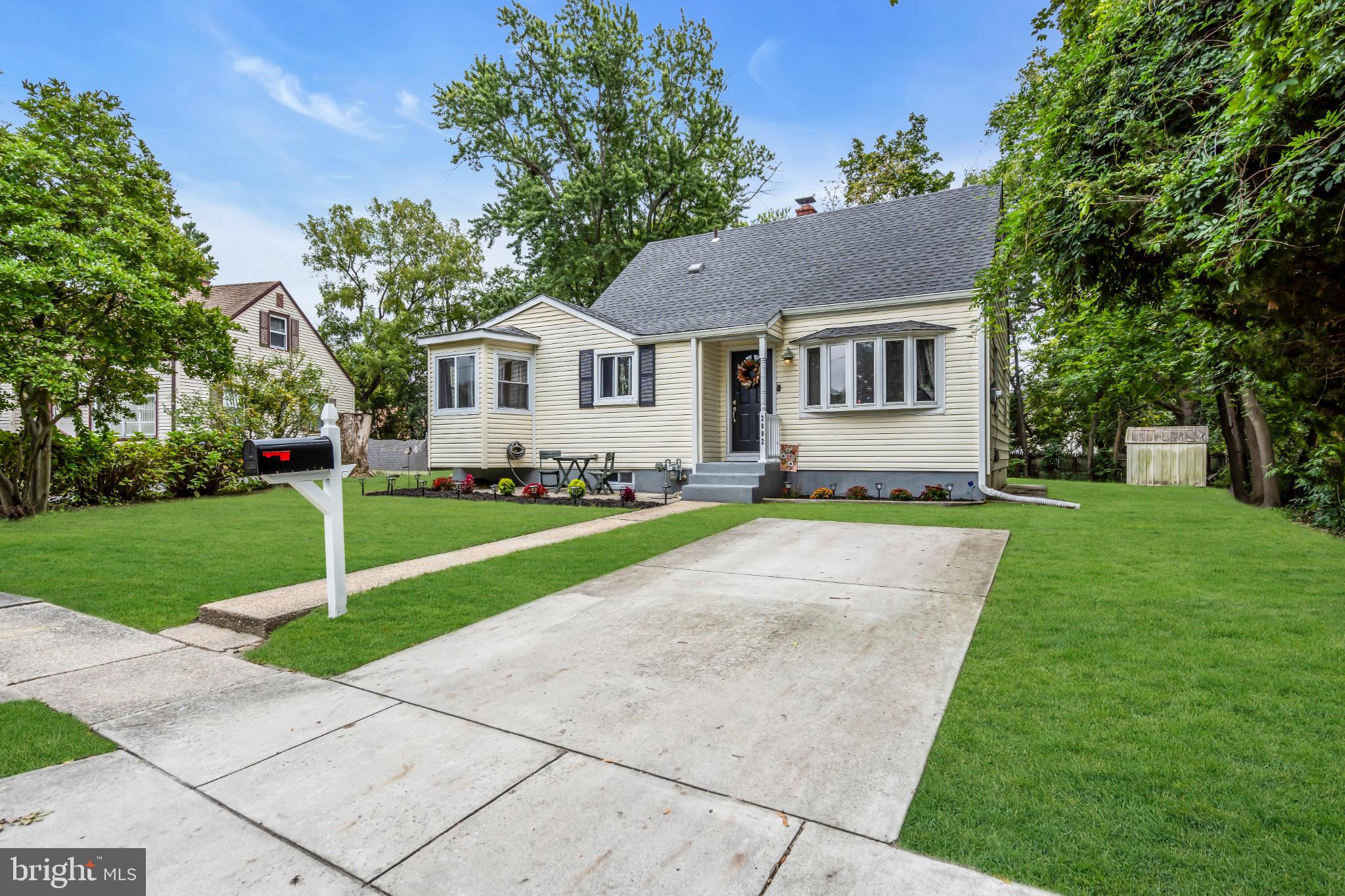 2002 South Brighton Avenue Clementon, NJ 08021 - Photo 6 of 38 a front view of a house with a yard