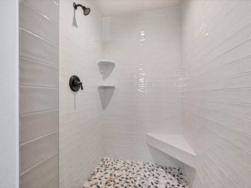 2719 Post Oak Road Webberville, TX 78653 - Photo 14 of 23 a bathroom with a bathtub