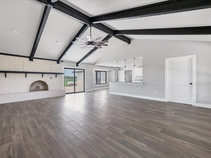 2719 Post Oak Road Webberville, TX 78653 - Photo 5 of 23 a view of a livingroom with wooden floor