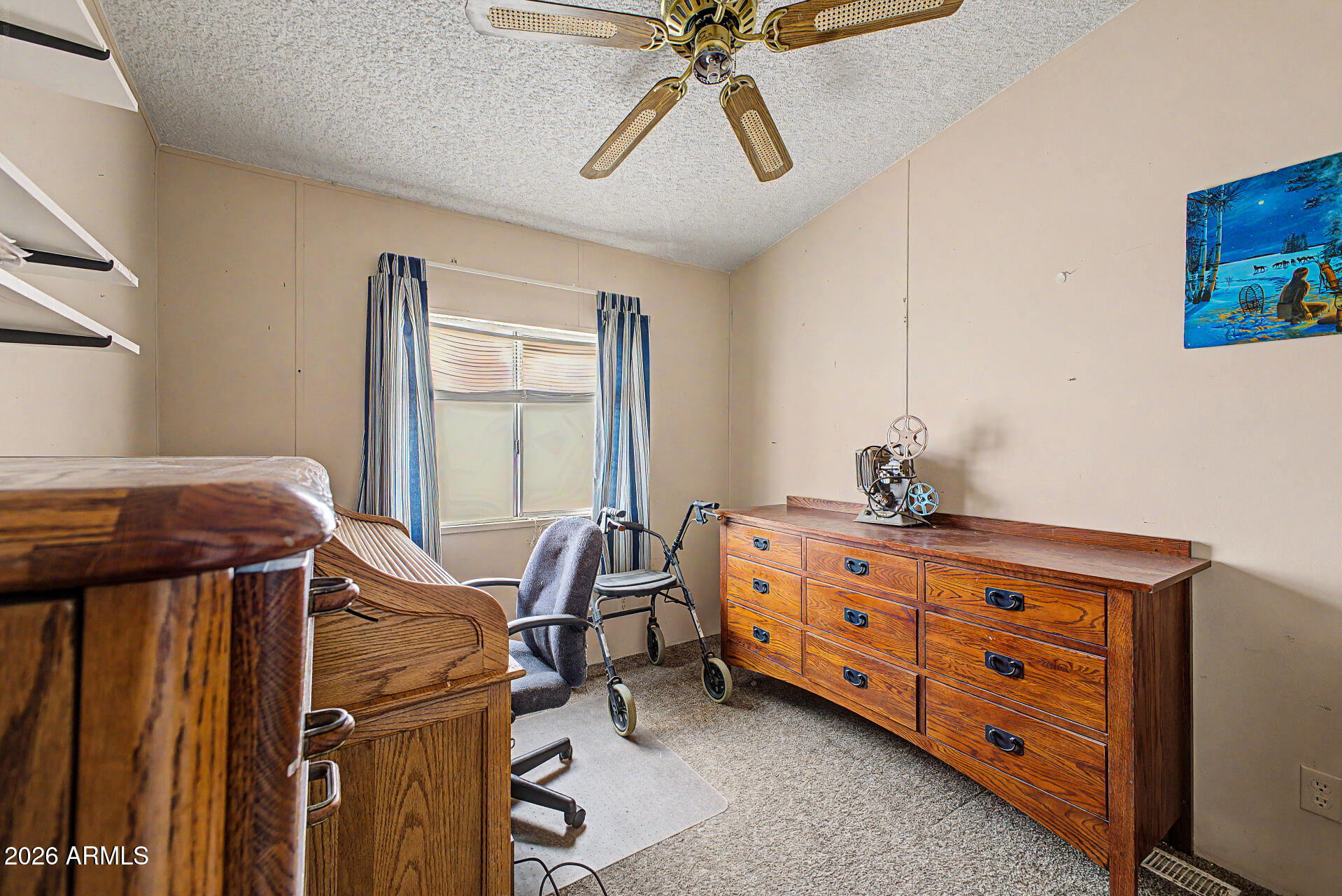 8595 North Palo Verde Road Florence, AZ 85132 - Photo 20 of 41 a room with furniture and window