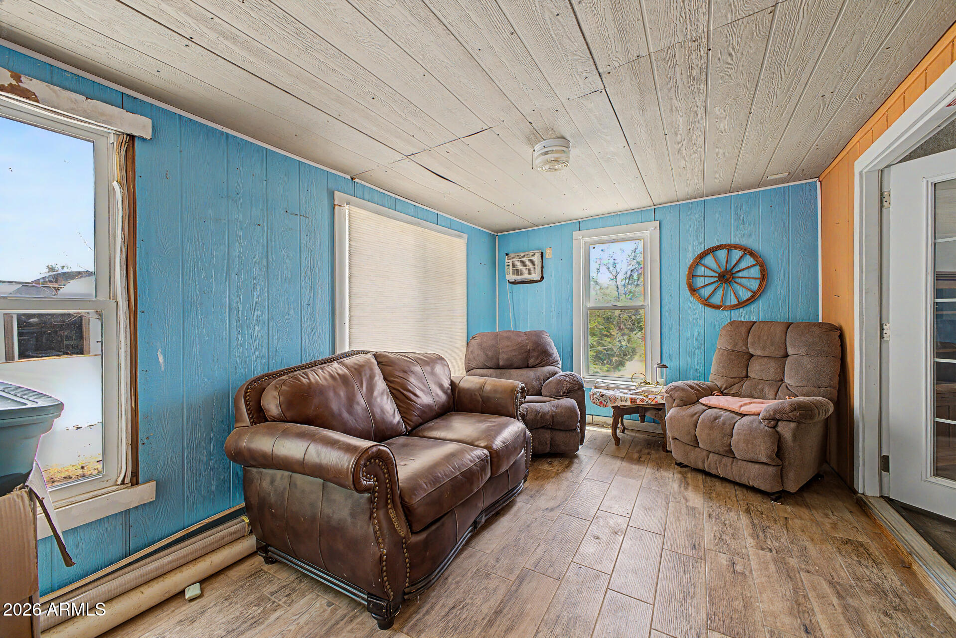 8595 North Palo Verde Road Florence, AZ 85132 - Photo 22 of 41 a living room with furniture and a large window