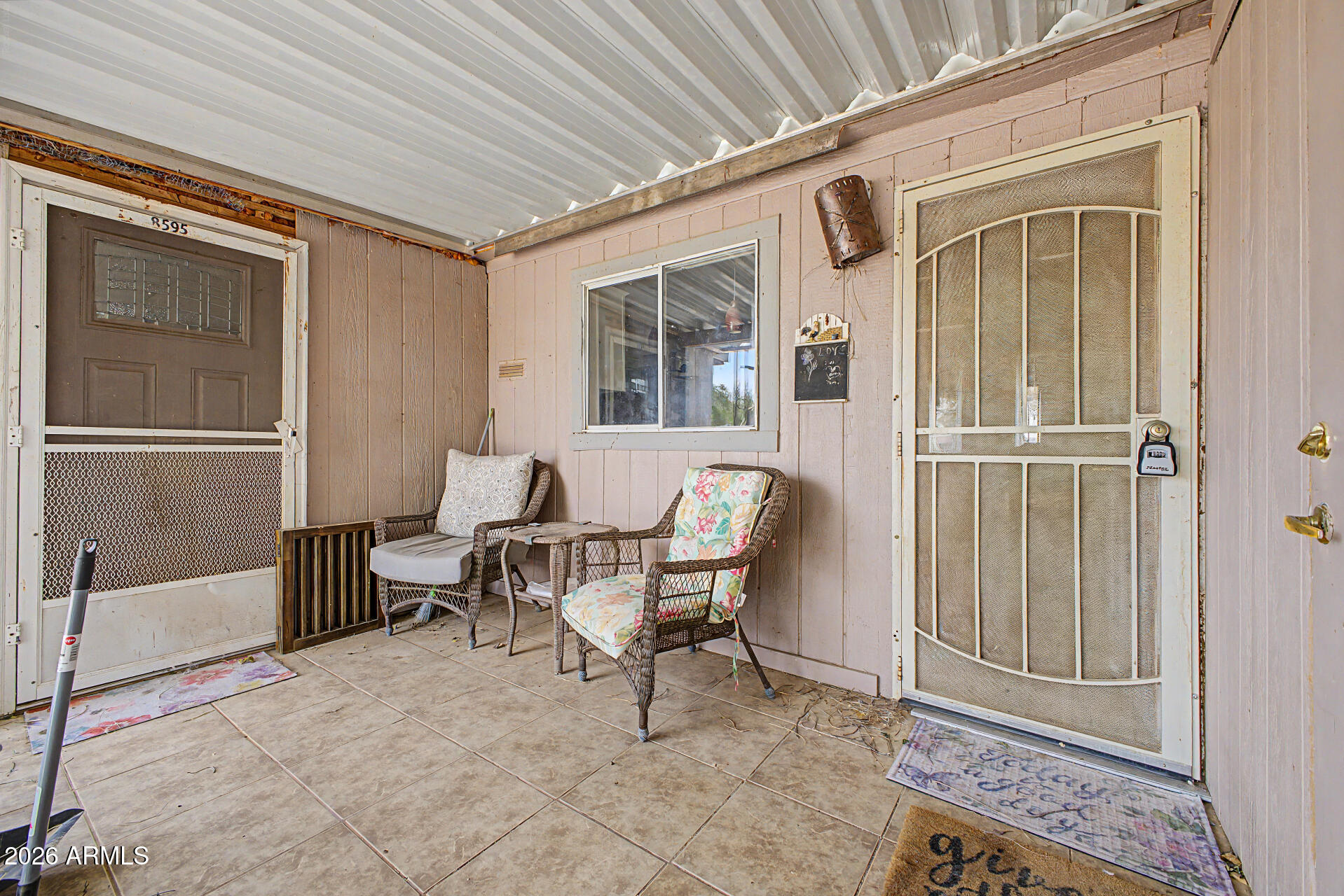 8595 North Palo Verde Road Florence, AZ 85132 - Photo 25 of 41 a balcony with furniture and a window