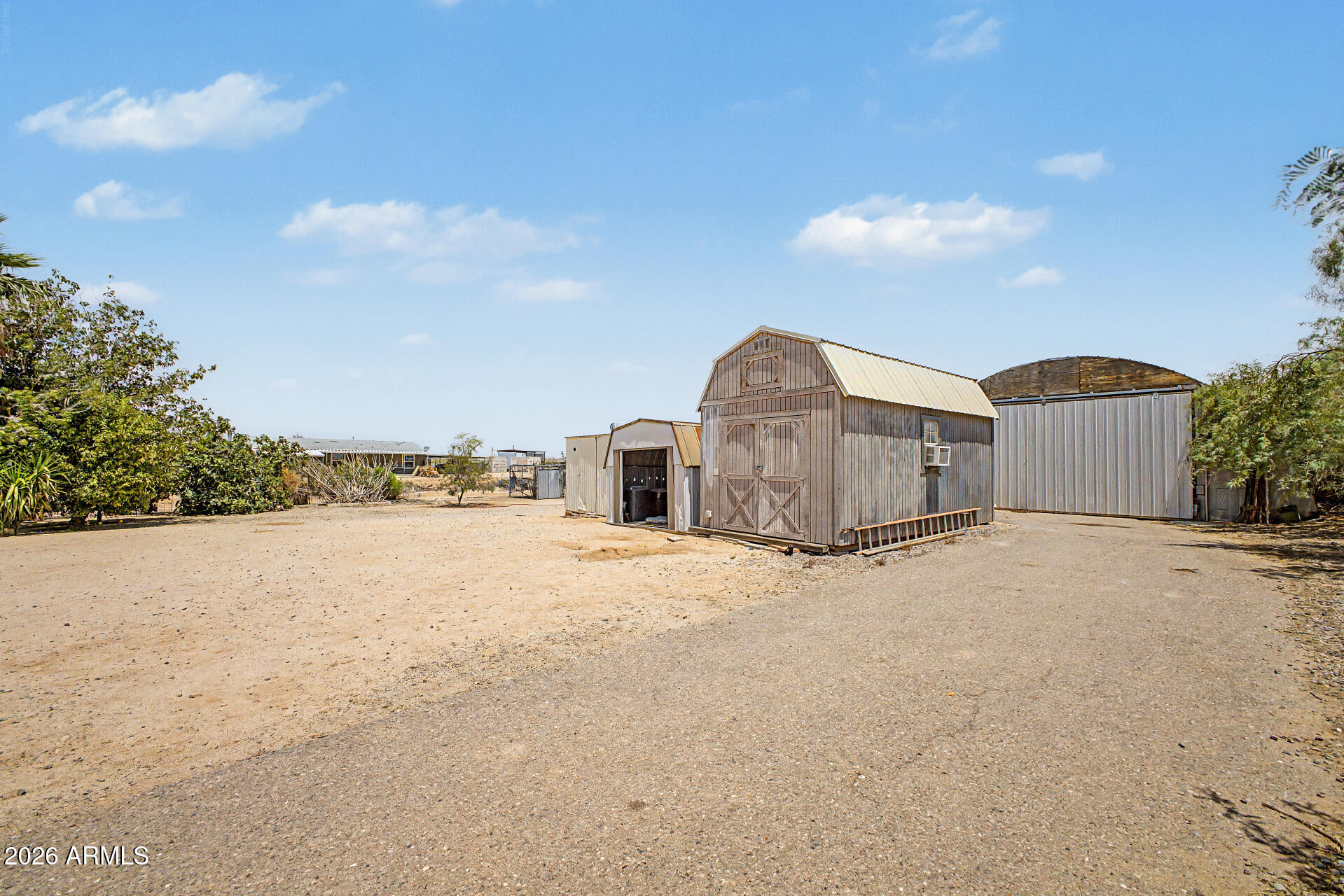 8595 North Palo Verde Road Florence, AZ 85132 - Photo 29 of 41 a view of a house with a yard and roof