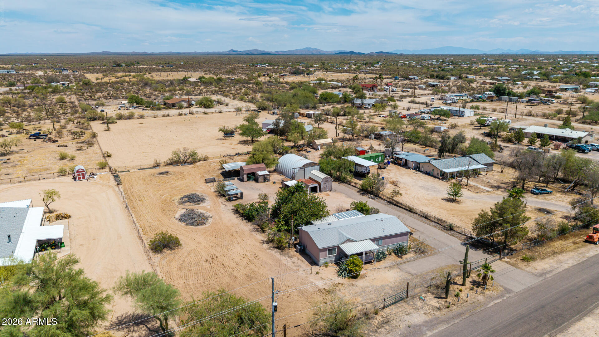 8595 North Palo Verde Road Florence, AZ 85132 - Photo 34 of 41 an aerial view of ocean and residential houses with outdoor space