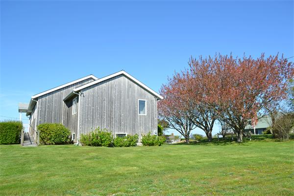 155 Sakonnet Point Road Little Compton, RI 02837 - Photo 5 of 15 a view of a back yard of the house