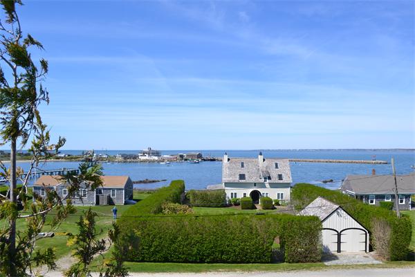 155 Sakonnet Point Road Little Compton, RI 02837 - Photo 6 of 15 an aerial view of a house with a yard and lake view
