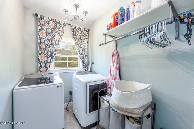 a bathroom with a bathtub and window