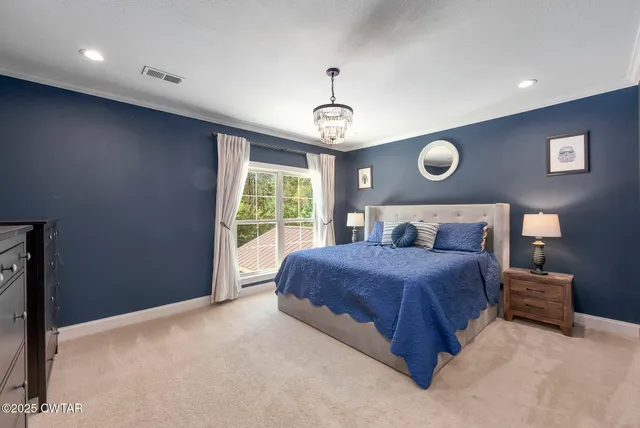 a view of a livingroom with furniture wooden floor and window