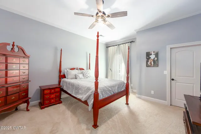 an aerial view of a house with outdoor space
