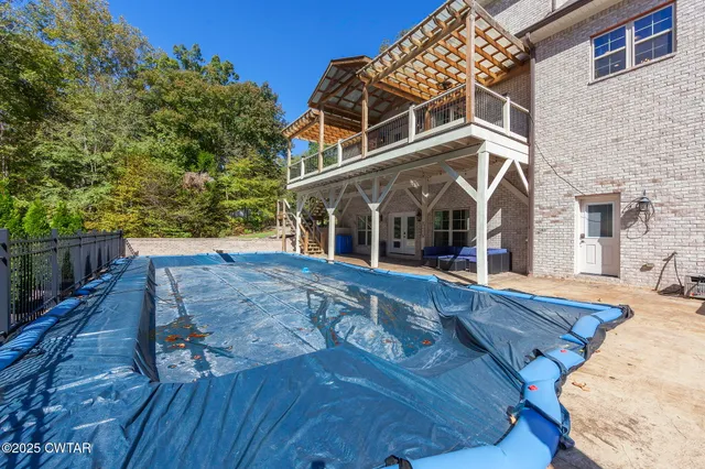 an aerial view of residential house with outdoor space