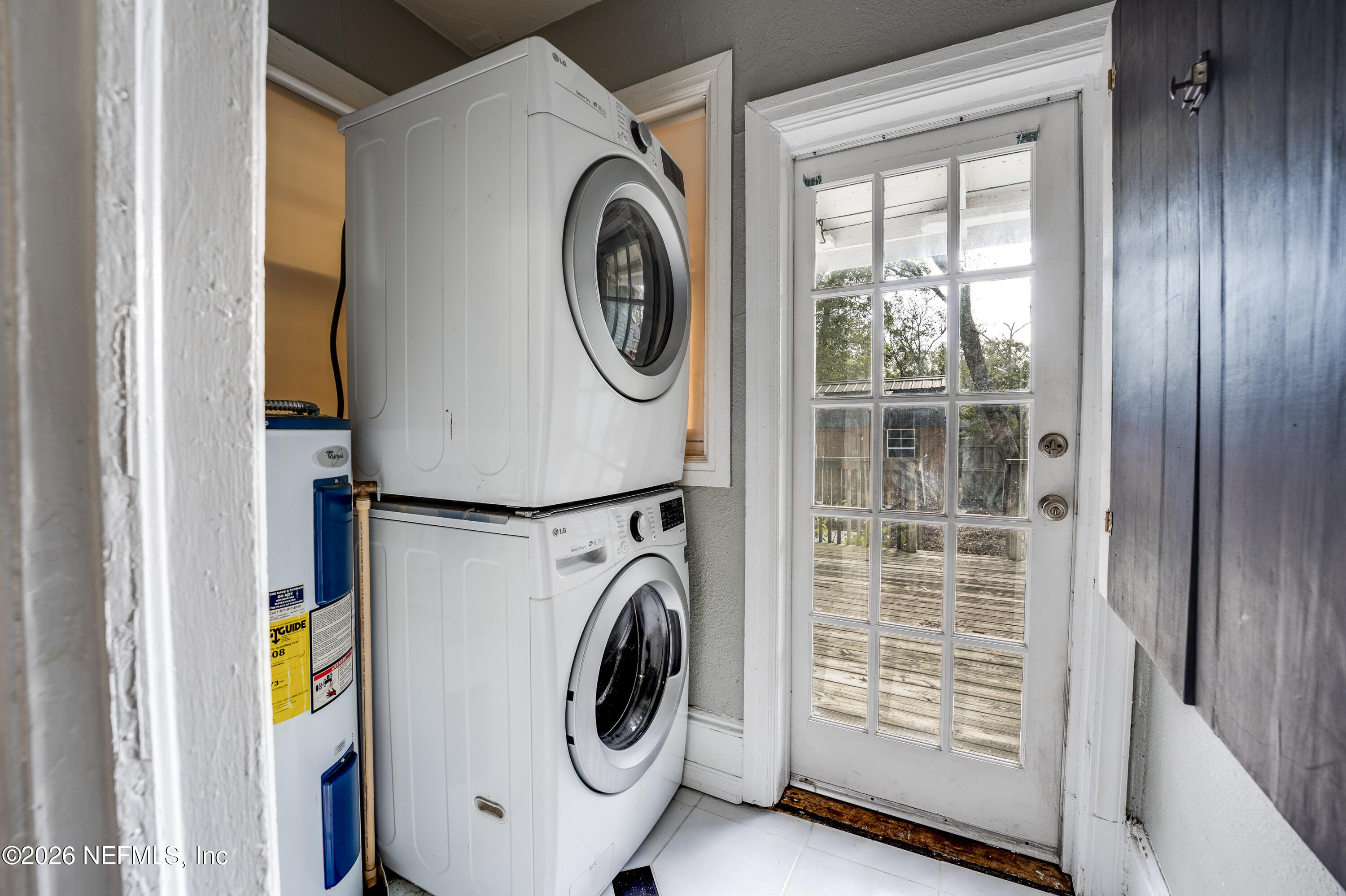 4560 French Street Jacksonville, FL 32205 - Photo 20 of 38 a utility room with dryer and washer