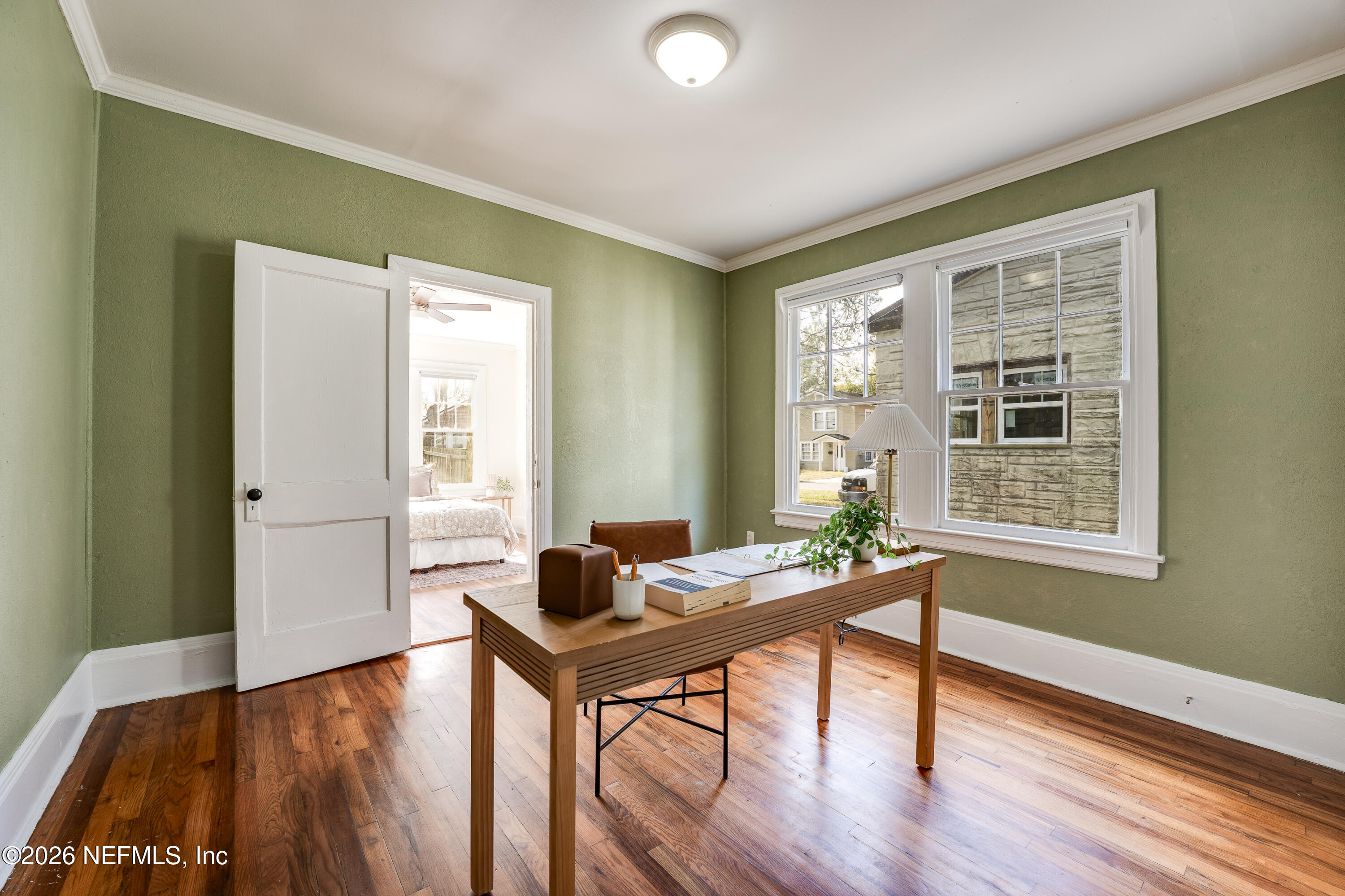 4560 French Street Jacksonville, FL 32205 - Photo 21 of 38 a workspace with wooden floor and a window