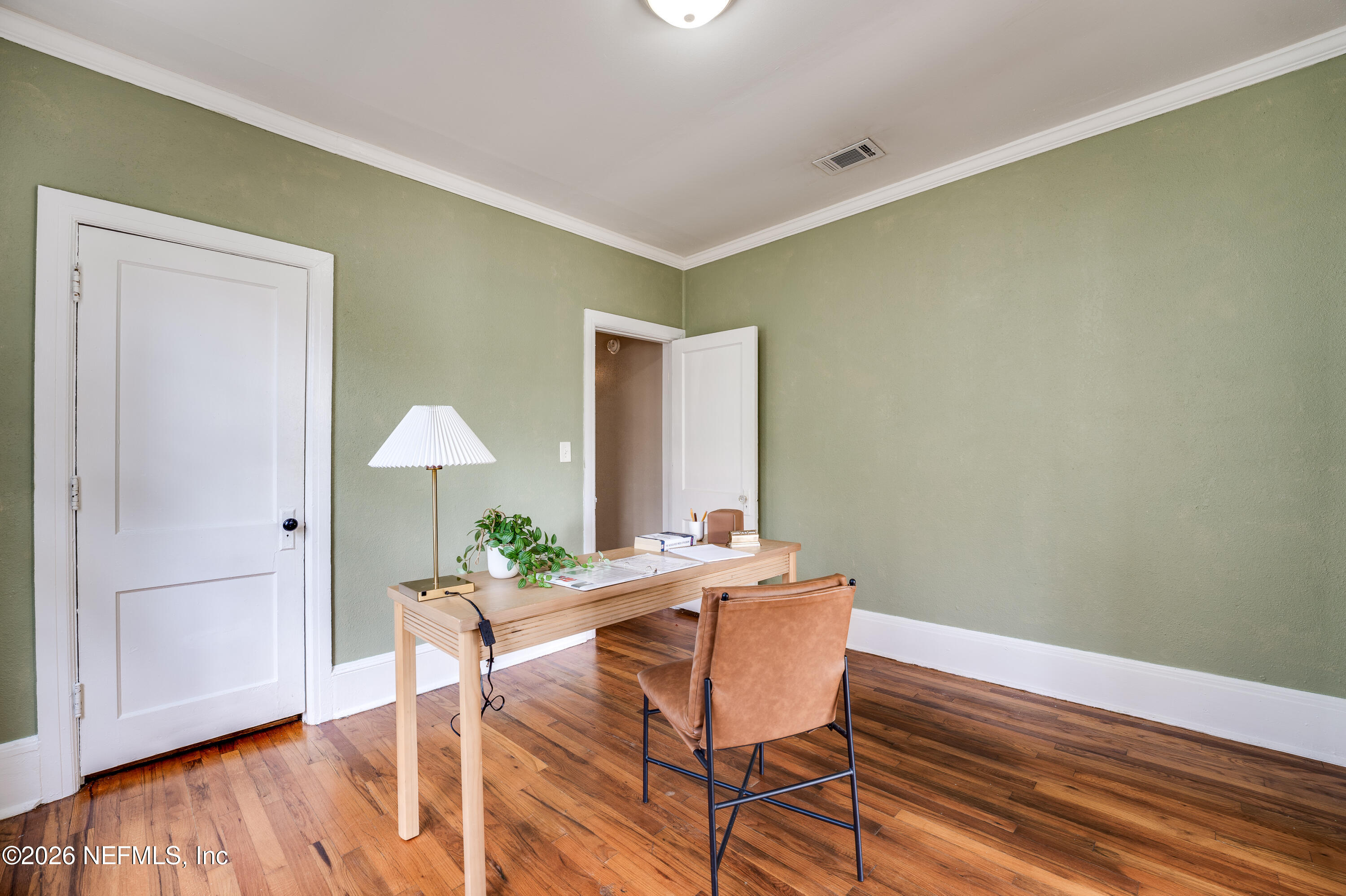 4560 French Street Jacksonville, FL 32205 - Photo 22 of 38 a view of a dining room with furniture and wooden floor