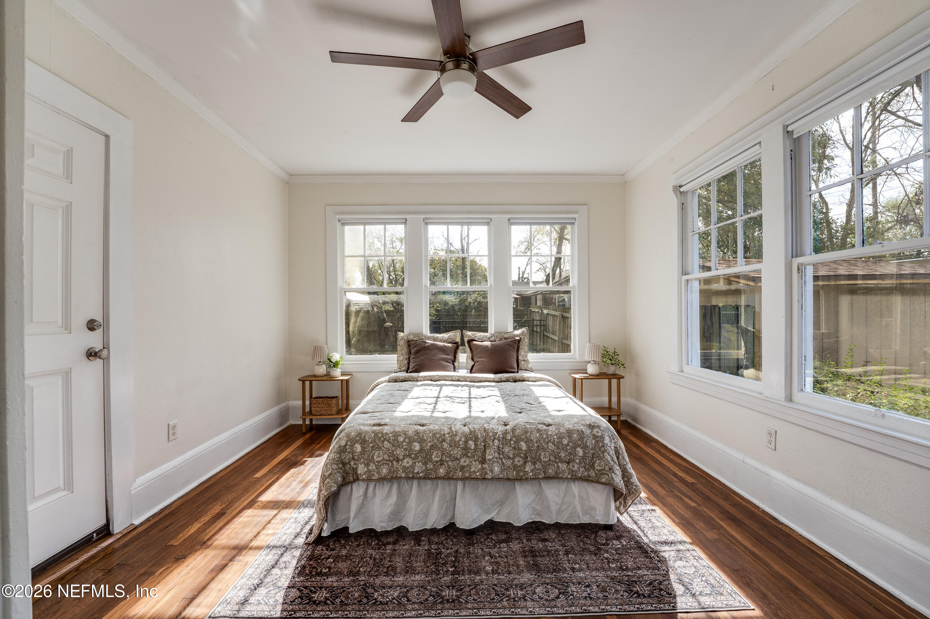 4560 French Street Jacksonville, FL 32205 - Photo 23 of 38 a large bedroom with bed and wooden floor