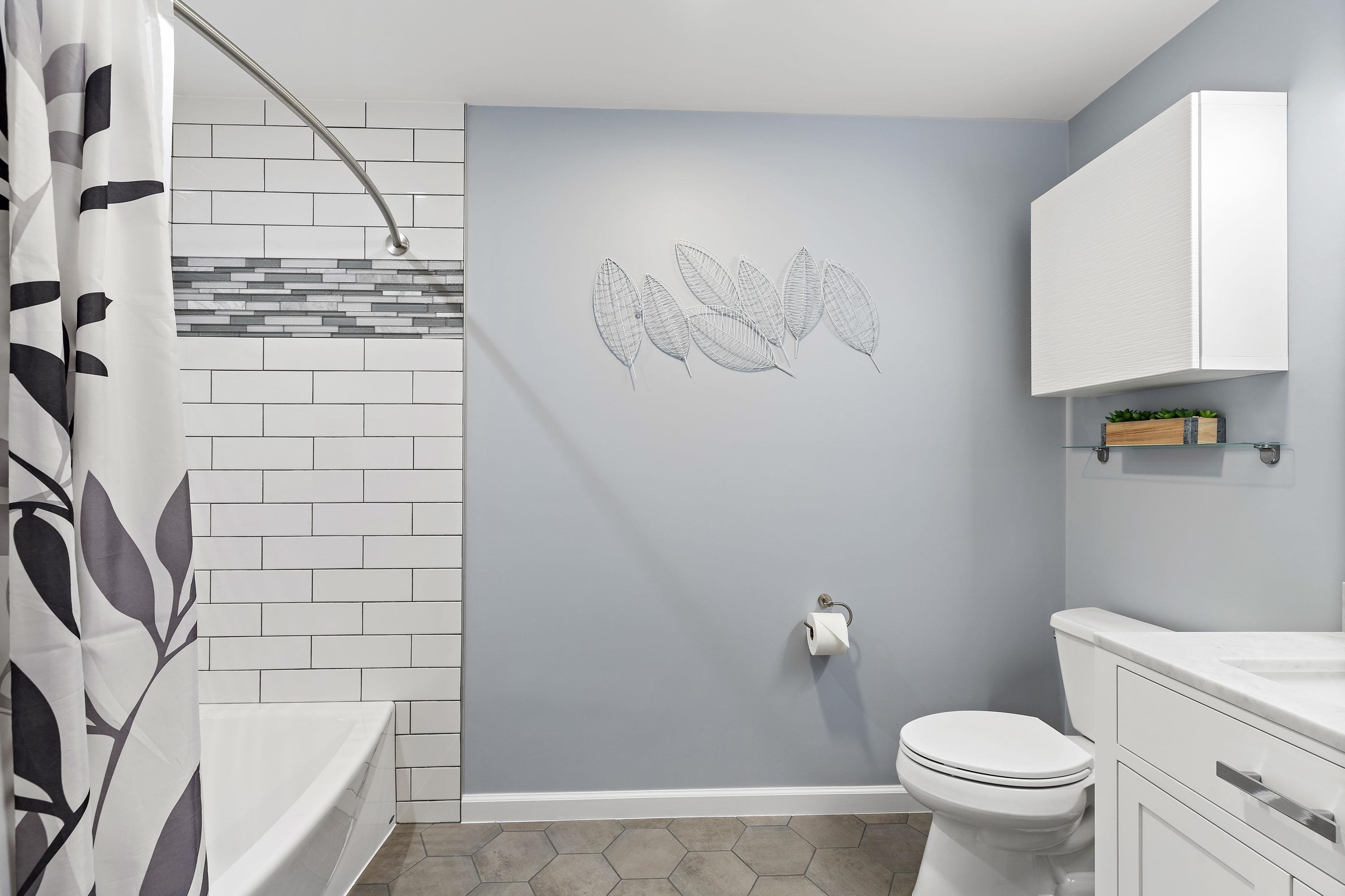 203-207 Hackensack Plank Road, Unit 4B Weehawken, NJ 07086 - Photo 11 of 27 a bathroom with a toilet and a shower