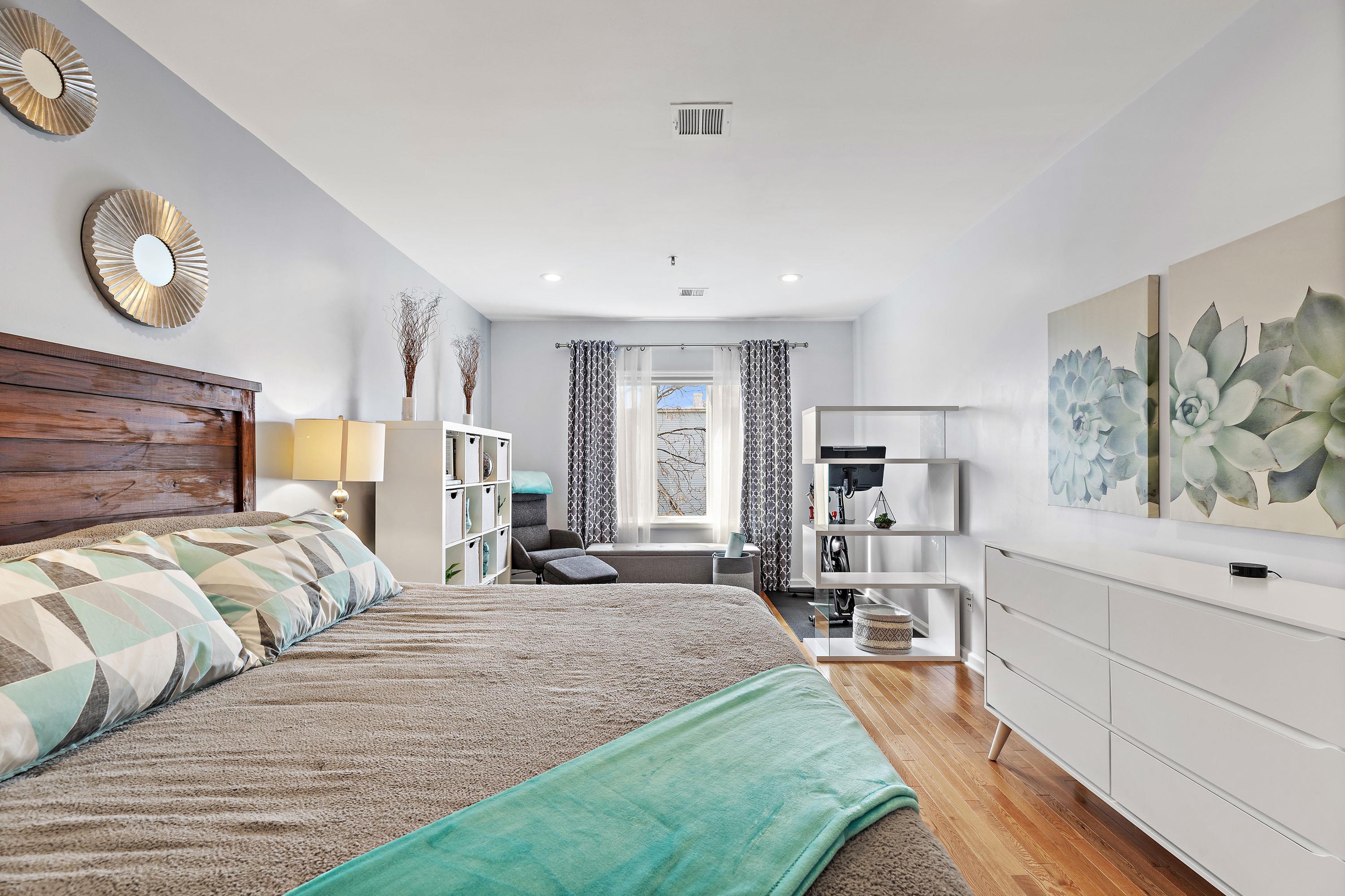 203-207 Hackensack Plank Road, Unit 4B Weehawken, NJ 07086 - Photo 13 of 27 a bedroom with a bed and window