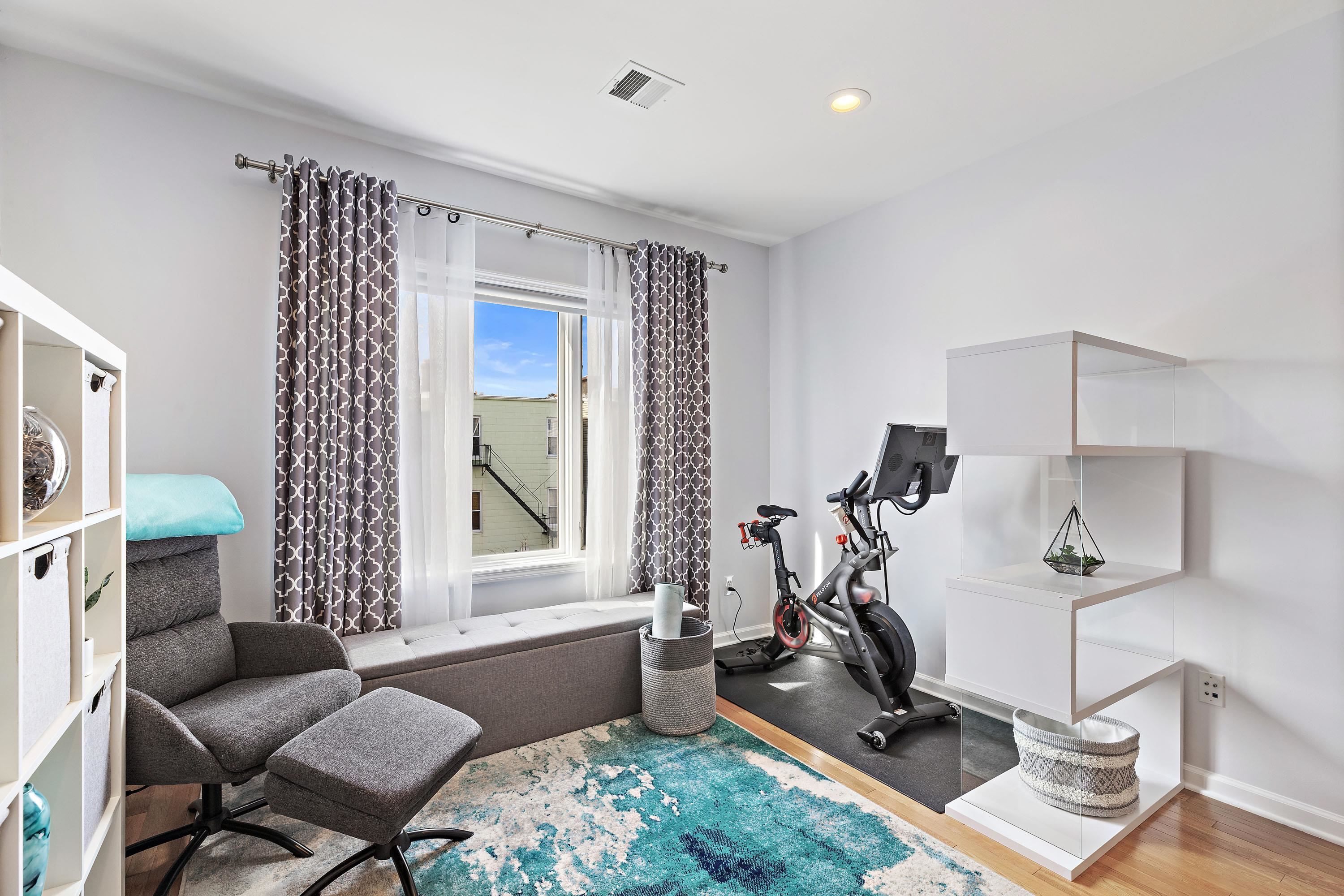 203-207 Hackensack Plank Road, Unit 4B Weehawken, NJ 07086 - Photo 14 of 27 a view of a room with gym equipment