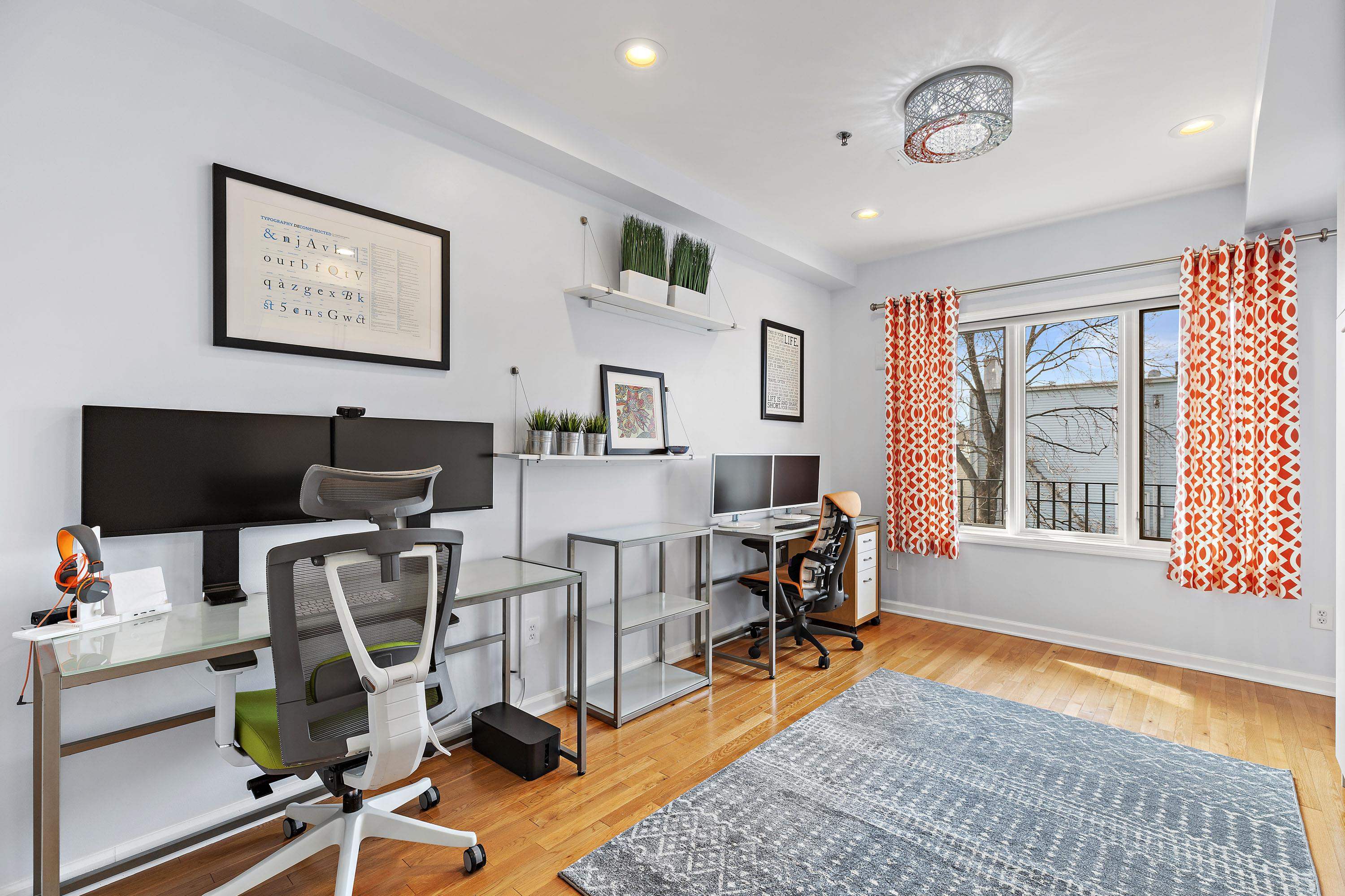 203-207 Hackensack Plank Road, Unit 4B Weehawken, NJ 07086 - Photo 19 of 27 a view of a workspace with furniture and a window