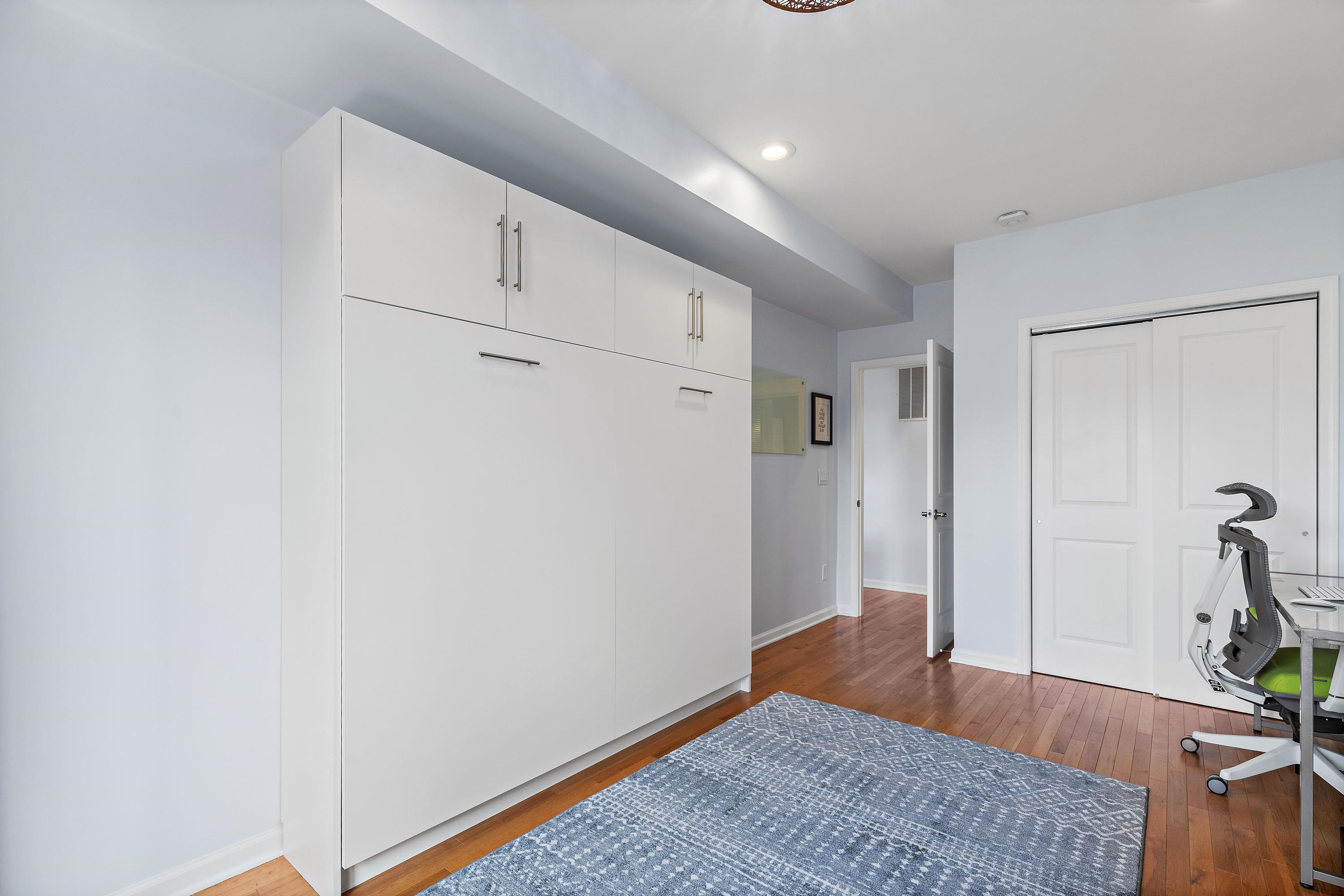 203-207 Hackensack Plank Road, Unit 4B Weehawken, NJ 07086 - Photo 20 of 27 a view of hallway with wooden floor