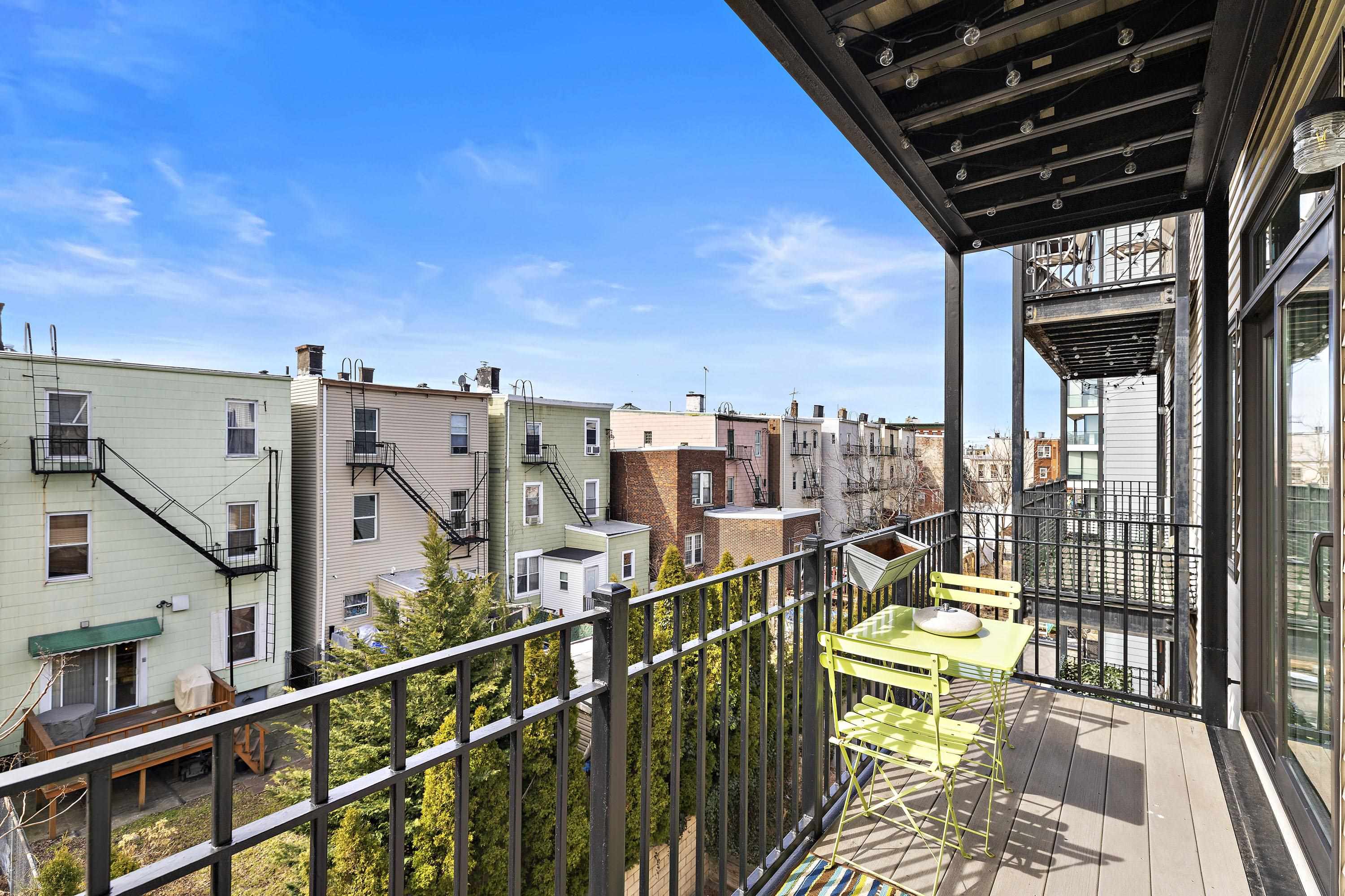 203-207 Hackensack Plank Road, Unit 4B Weehawken, NJ 07086 - Photo 23 of 27 a view of a balcony with city view