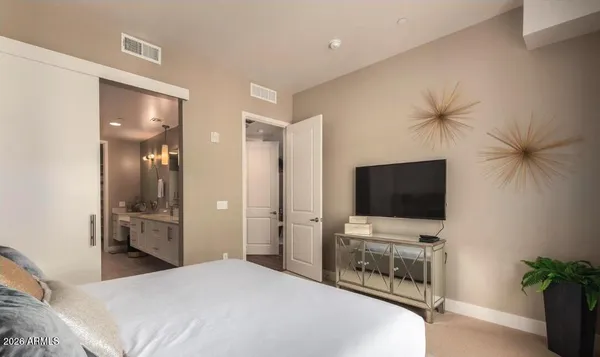 a bathroom with a double vanity sink mirror and double